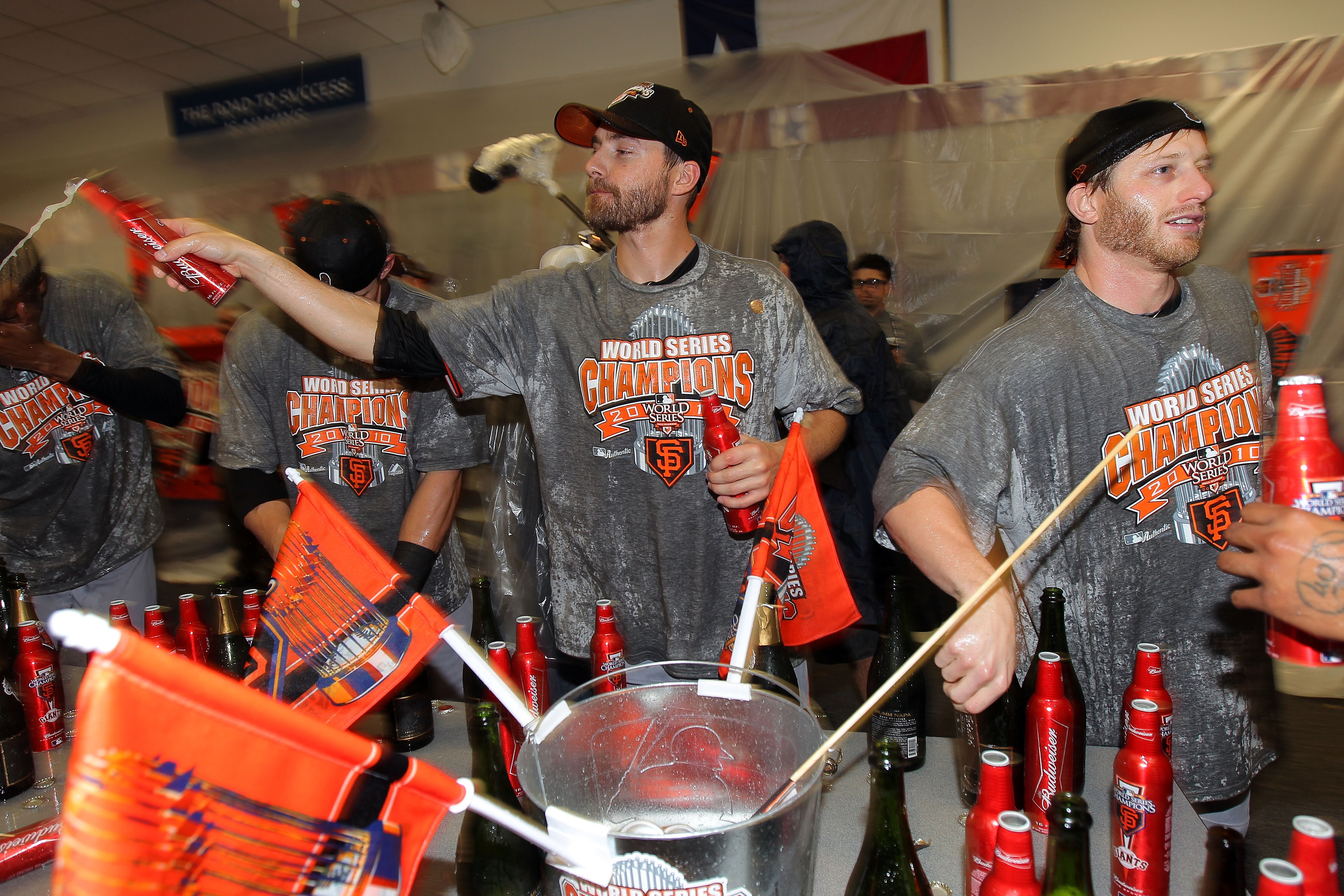 ARLINGTON, TX - NOVEMBER 01:  Madison Bumgarner #40 of the San Francisco Giants celebrate in the locker room after the Giants won 3-1 against the Texas Rangers in Game Five of the 2010 MLB World Series at Rangers Ballpark in Arlington on November 1, 2010 