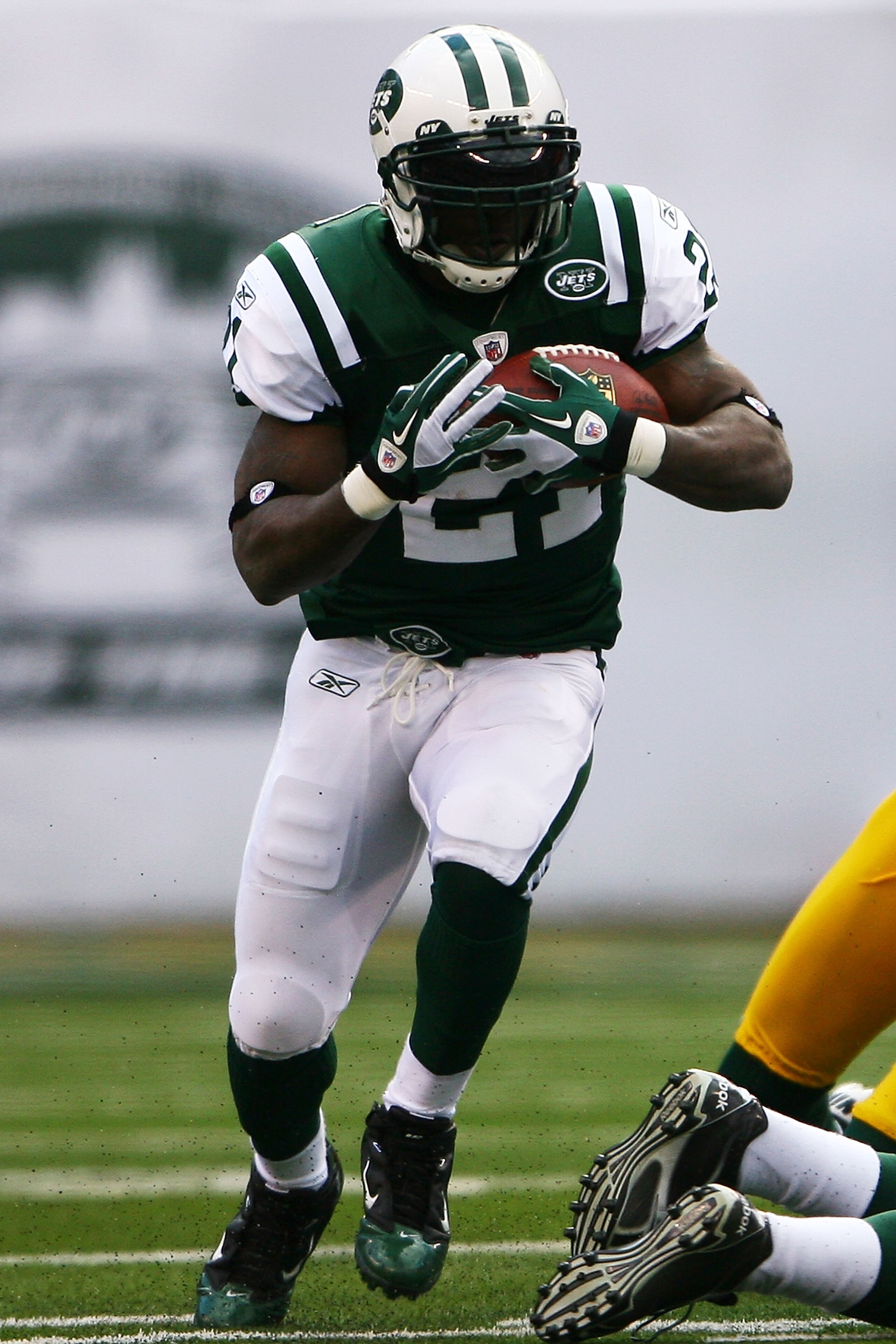 EAST RUTHERFORD, NJ - OCTOBER 31:   LaDainian Tomlinson #21 of the New York Jets runs with the ball during a game against the Green Bay Packers on October 31, 2010 at the New Meadowlands Stadium in East Rutherford, New Jersey.  The Packers defeated the Je