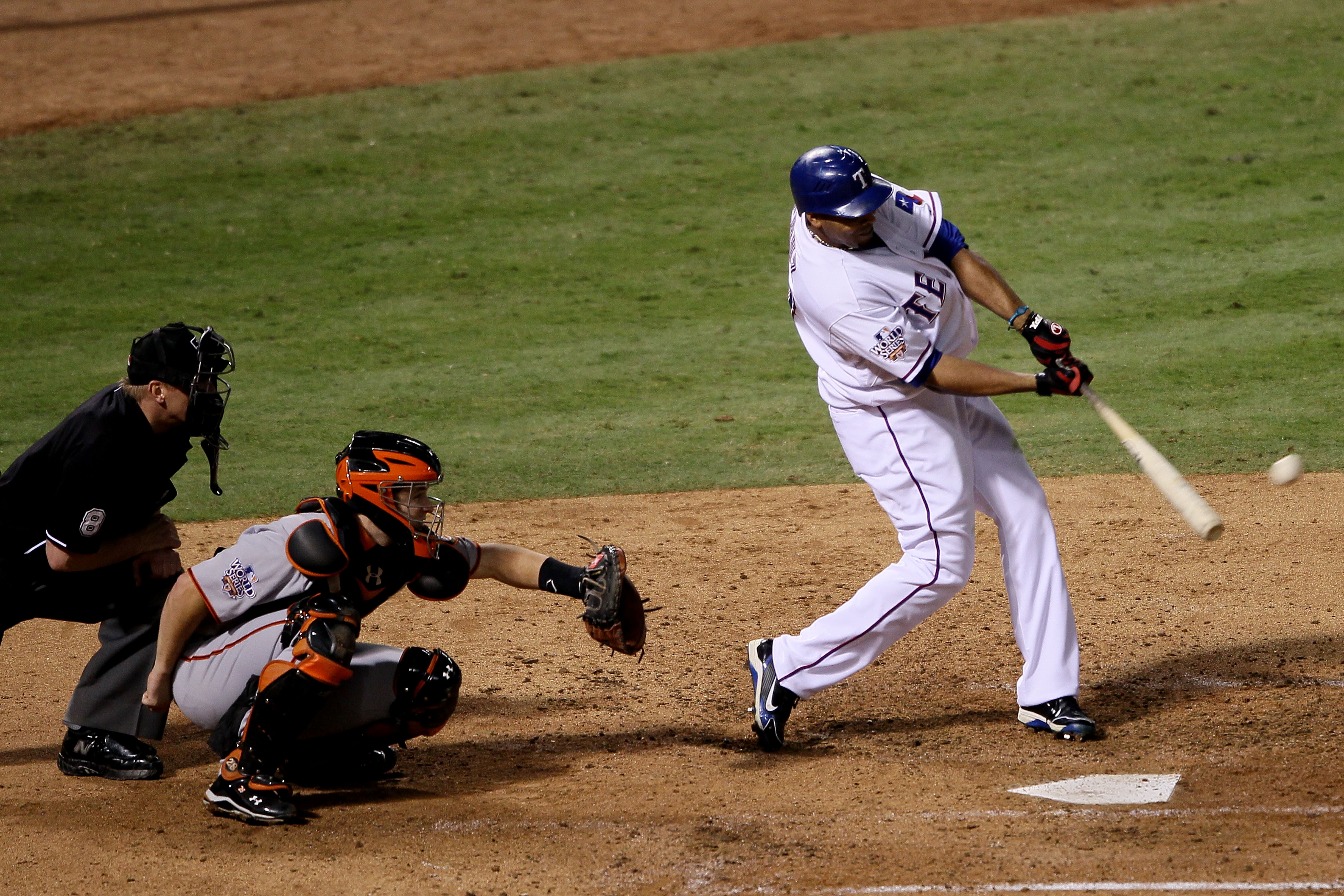 ARLINGTON, TX - NOVEMBER 01:  Nelson Cruz #17 of the Texas Rangers hits a solo home in the seventh inning against Tim Lincecum #55 of the San Francisco Giants in Game Five of the 2010 MLB World Series at Rangers Ballpark in Arlington on November 1, 2010 i
