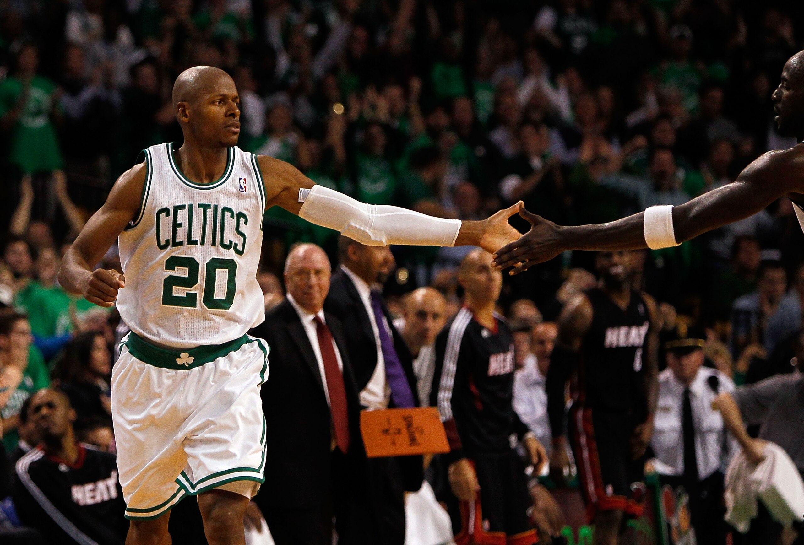 BOSTON, MA - OCTOBER 26: Ray Allen #20 of the Boston Celtics celebrates his basket with teammate Kevin Garnett #5 during a game against the Miami Heat at the TD Banknorth Garden on October 26, 2010 in Boston, Massachusetts. NOTE TO USER: User expressly a BOSTON, MA - OCTOBER 26: Ray Allen #20 of the Boston Celtics celebrates his basket with teammate Kevin Garnett #5 during a game against the Miami Heat at the TD Banknorth Garden on October 26, 2010 in Boston, Massachusetts. NOTE TO USER: User expressly a