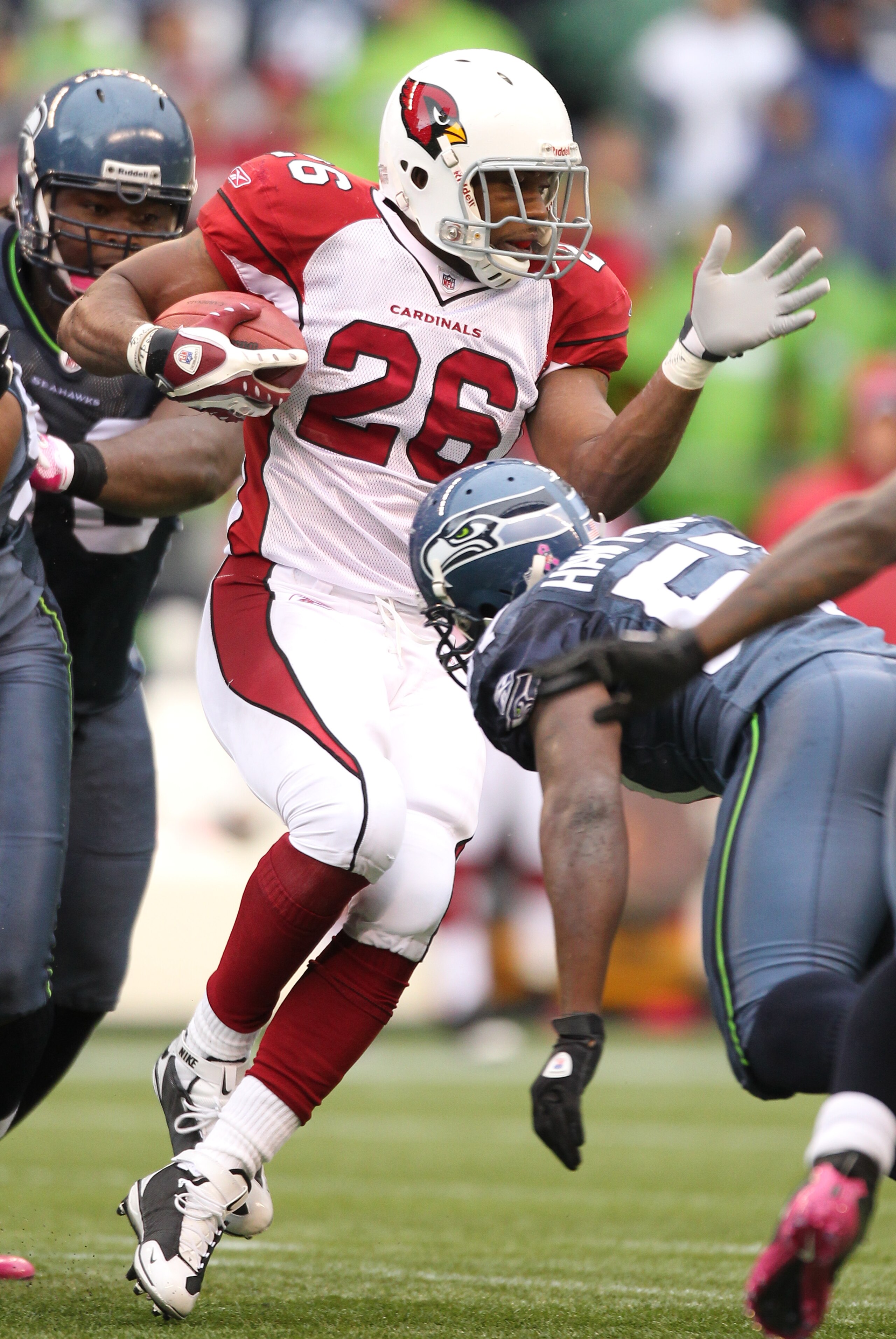 SEATTLE - OCTOBER 24: Running back Beanie Wells #26 of the Arizona Cardinals rushes against the Seattle Seahawks at Qwest Field on October 24, 2010 in Seattle, Washington. (Photo by Otto Greule Jr/Getty Images) SEATTLE - OCTOBER 24: Running back Beanie Wells #26 of the Arizona Cardinals rushes against the Seattle Seahawks at Qwest Field on October 24, 2010 in Seattle, Washington. (Photo by Otto Greule Jr/Getty Images)