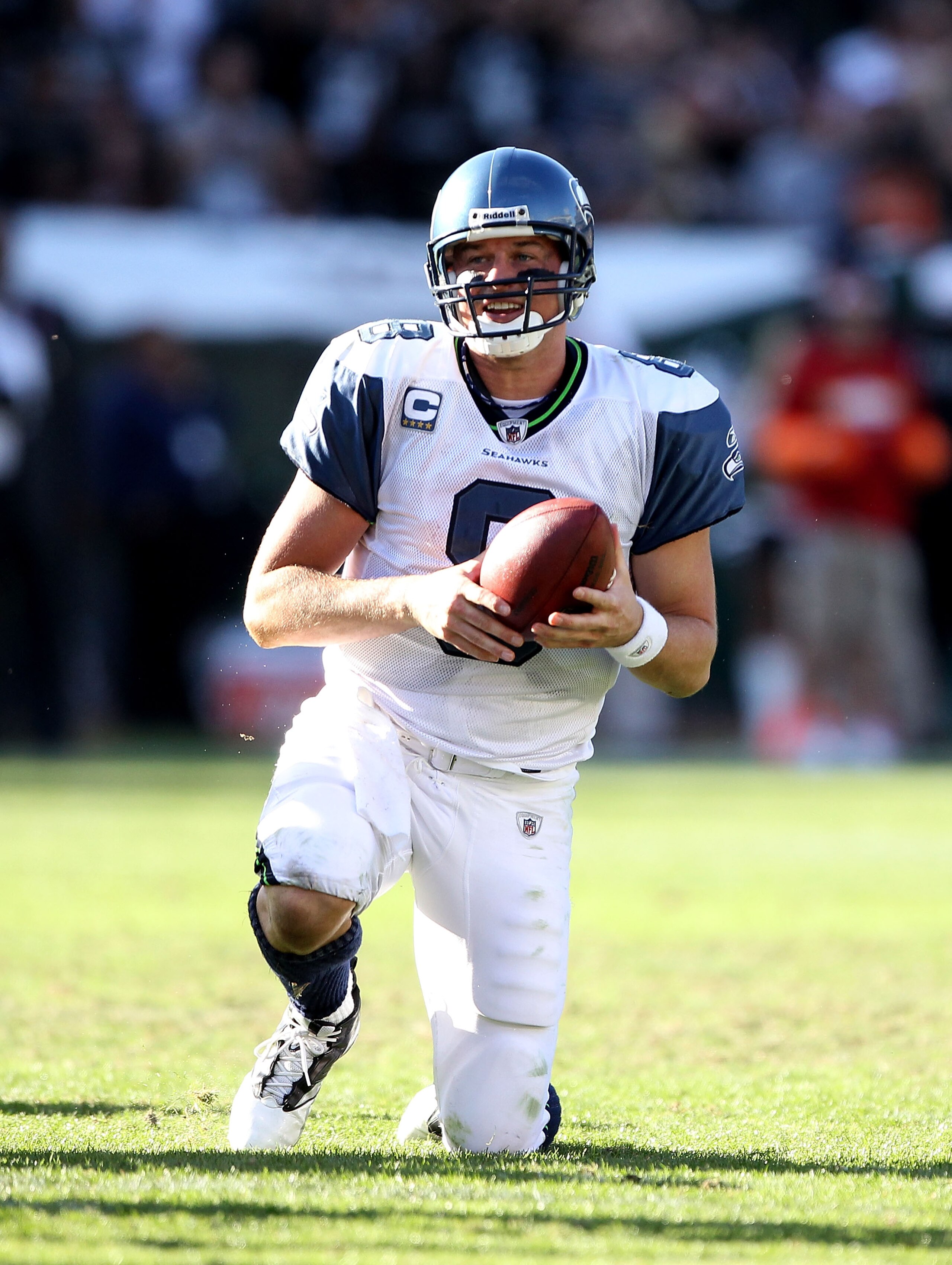 OAKLAND, CA - OCTOBER 31:  Matt Hasselbeck #8 of the Seattle Seahawks gets off the ground after he was sacked by the Oakland Raiders at Oakland-Alameda County Coliseum on October 31, 2010 in Oakland, California.  (Photo by Ezra Shaw/Getty Images)