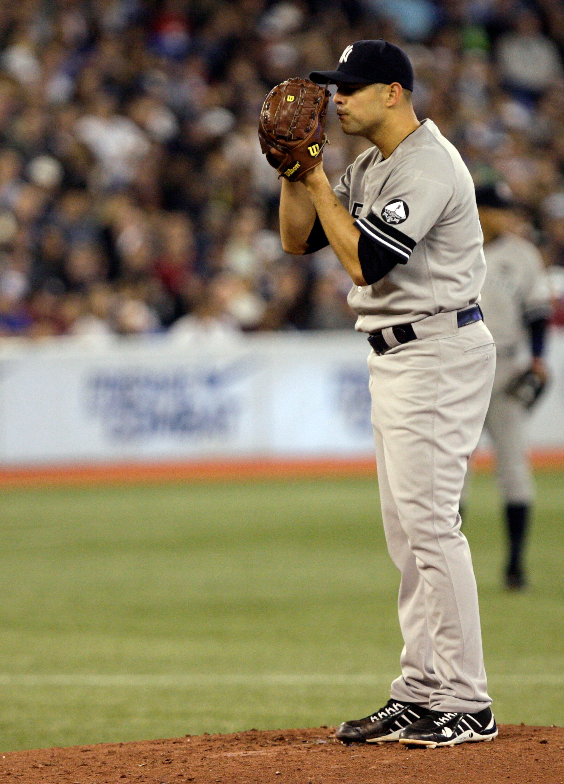 TORONTO, ON - SEPTEMBER 29: Javier Vasquez #31 of the New York Yankees sets up during a MLB game against the Toronto Blue Jays at the Rogers Centre September 29, 2010 in Toronto, Ontario, Canada. (Photo by Abelimages/Getty Images)