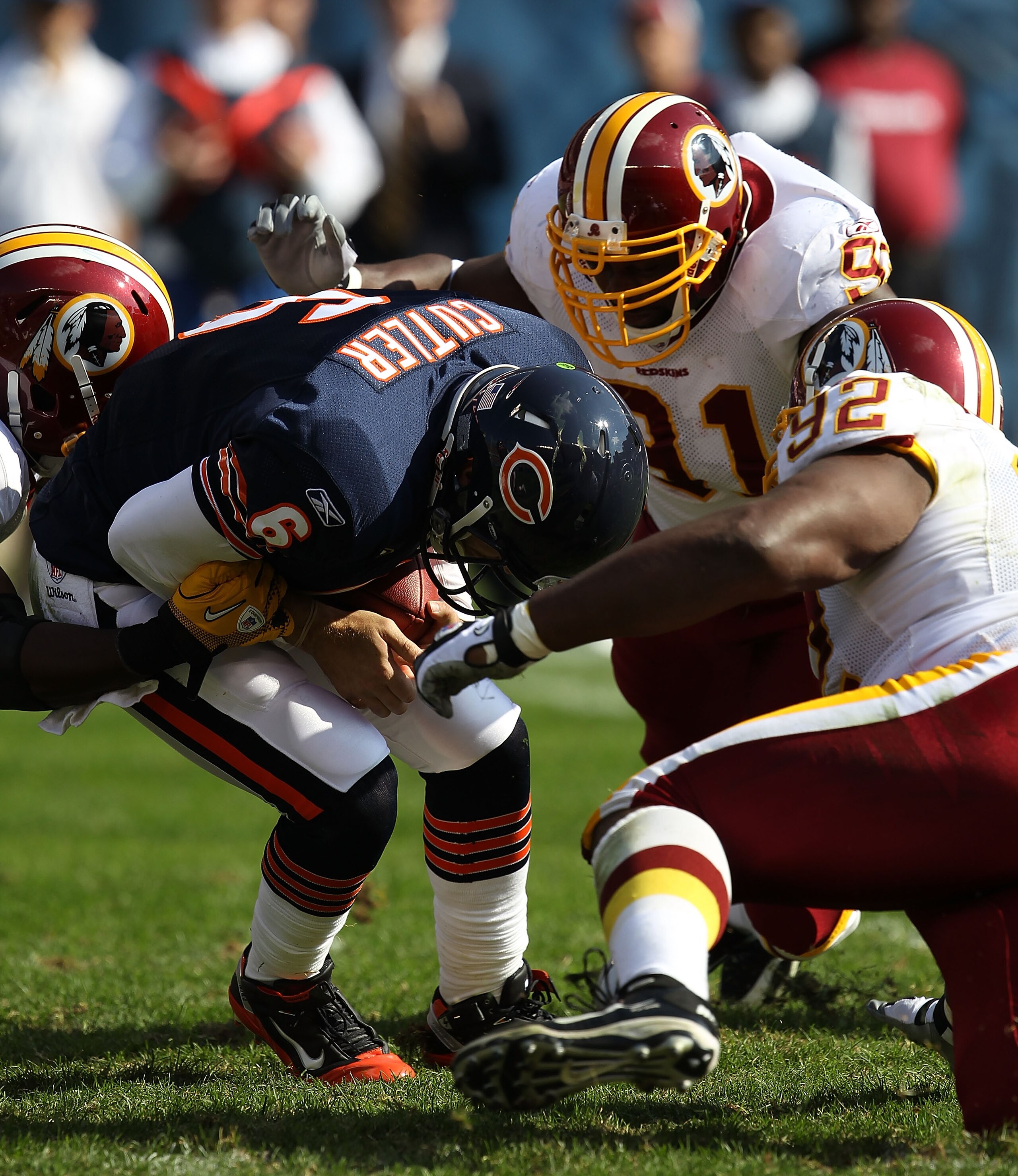 CHICAGO - OCTOBER 24: Jay Cutler #6 of the Chicago Bears is sacked by members of the Washington Redskins defense including Vonnie Hoilday #91 and Albert Haynesworth #92 at Soldier Field on October 24, 2010 in Chicago, Illinois. The Redskins defeated the B CHICAGO - OCTOBER 24: Jay Cutler #6 of the Chicago Bears is sacked by members of the Washington Redskins defense including Vonnie Hoilday #91 and Albert Haynesworth #92 at Soldier Field on October 24, 2010 in Chicago, Illinois. The Redskins defeated the B