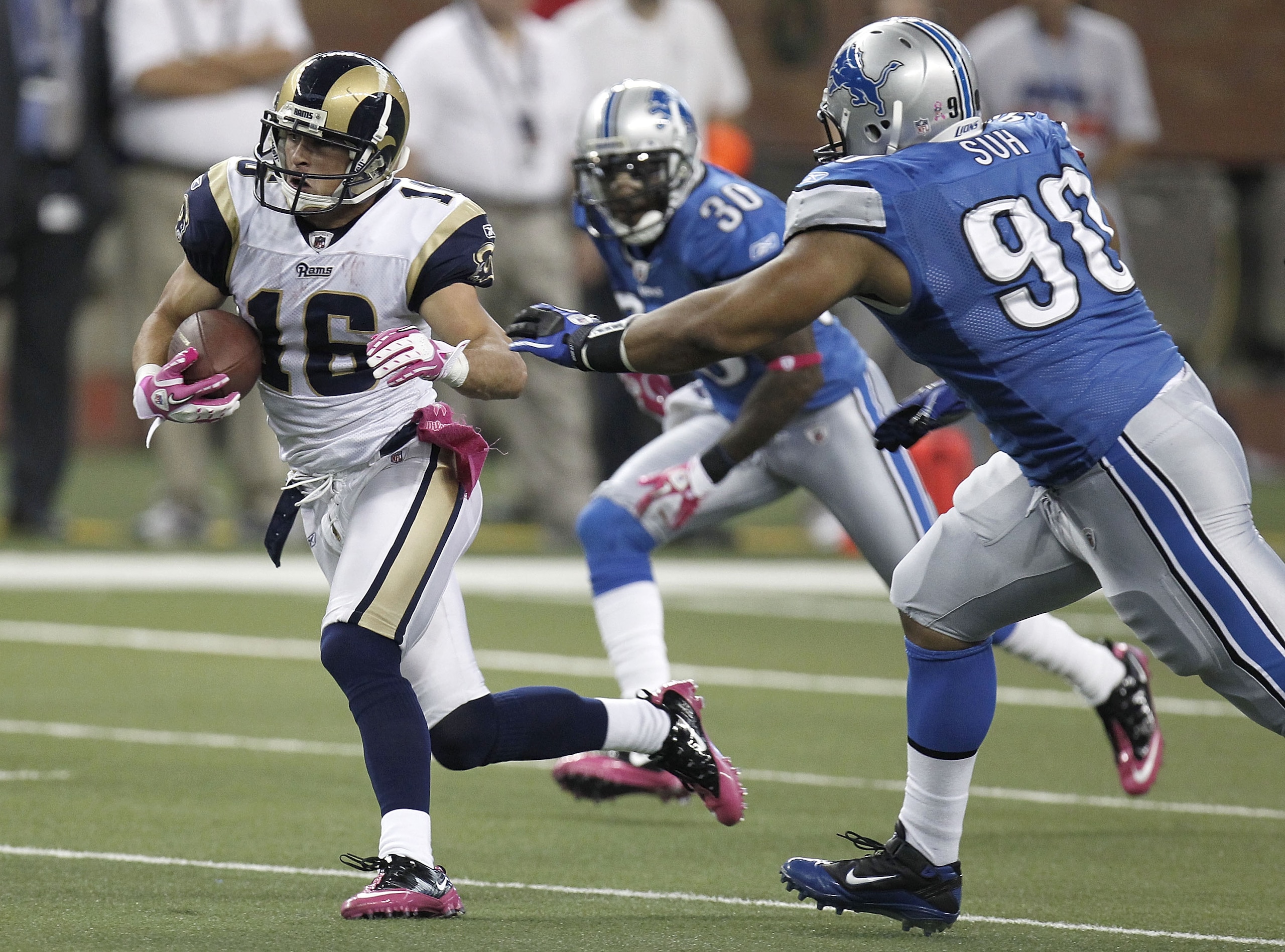 DETROIT - OCTOBER 10: Danny Amendola #16 of the St. Louis Rams tries to outrun the tackle of Ndamukong Suh #90 of the Detroit Lions on October 10, 2010 at Ford Field in Detroit, Michigan.  (Photo by Gregory Shamus/Getty Images)