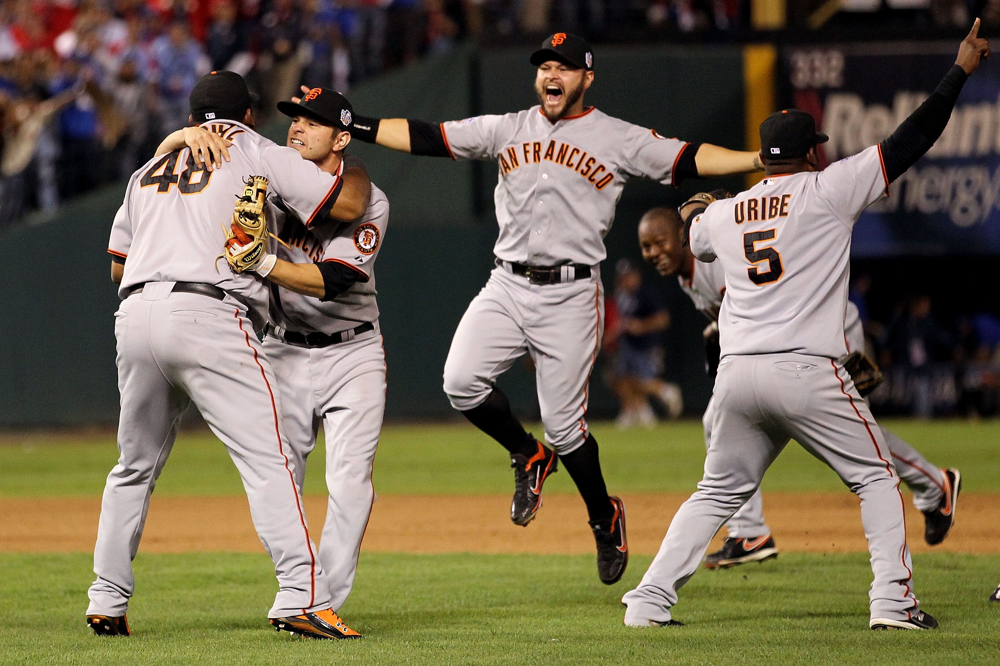 ARLINGTON, TX - NOVEMBER 01:  (L-R) Pablo Sandoval #48, Freddy Sanchez #21, Cody Ross #13, Edgar Renteria #16 and Juan Uribe #5 of the San Francisco Giants celebrate after they won 3-1 against the Texas Rangers in Game Five of the 2010 MLB World Series at