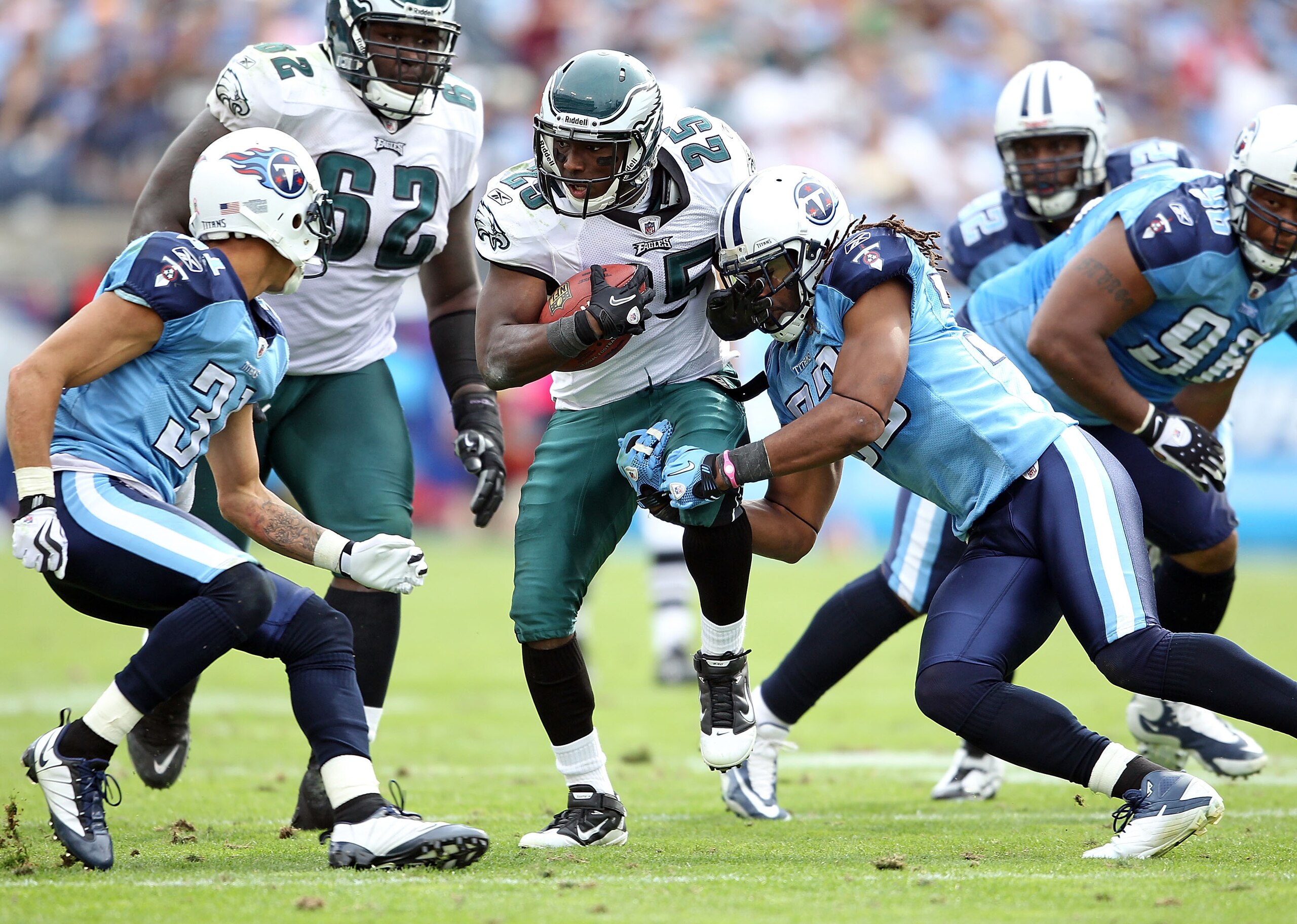 NASHVILLE, TN - OCTOBER 24:  LeSean McCoy #25 of the Philadelphia Eagles is tackled by Michael Griffin #33 during the NFL game against the Tennessee Titans at LP Field on October 24, 2010 in Nashville, Tennessee.  (Photo by Andy Lyons/Getty Images)