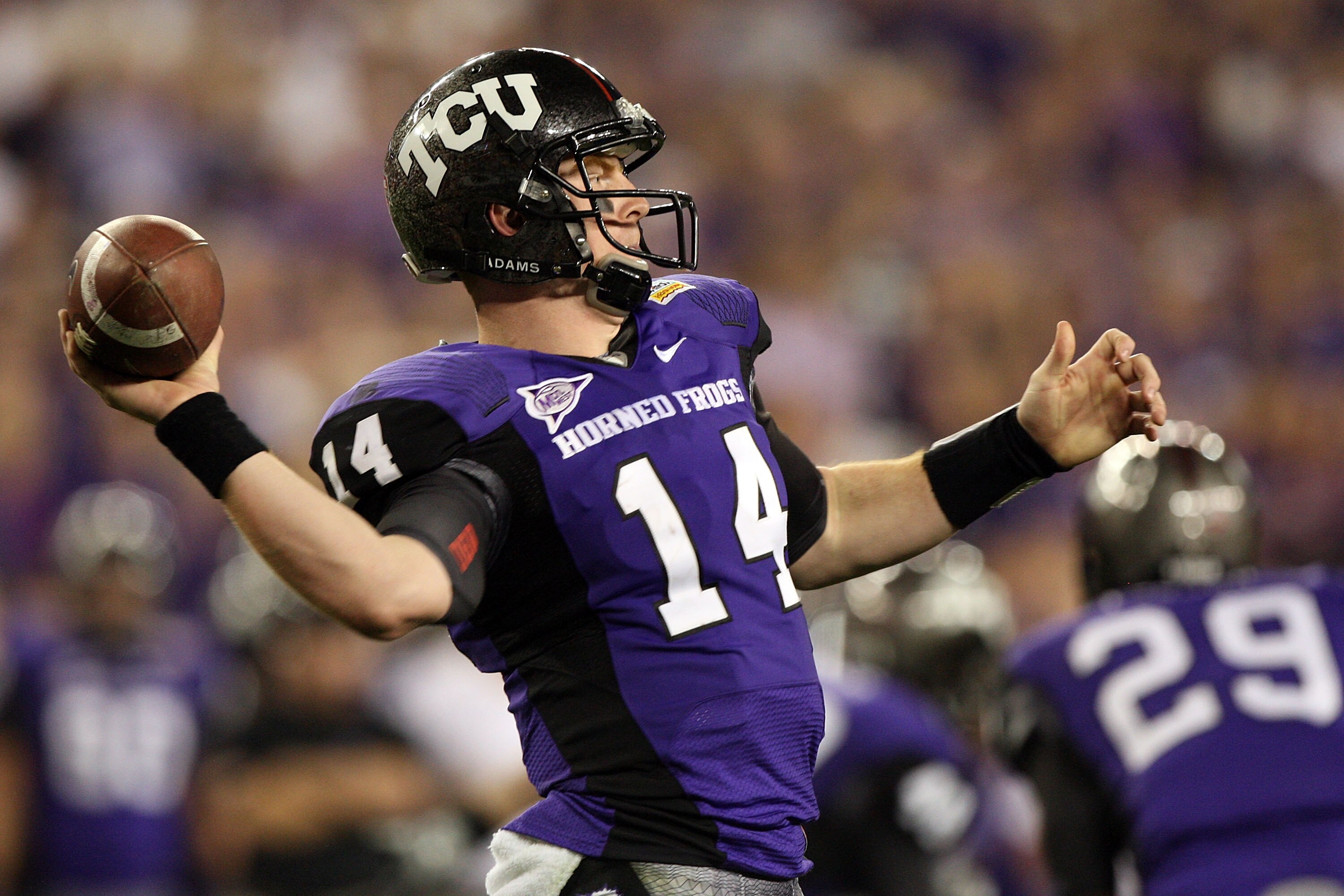 GLENDALE, AZ - JANUARY 04:  Quarterback Andy Dalton #14 of the TCU Horned Frogs passes the ball in the second half against the Boise State Broncos during the Tostitos Fiesta Bowl at the Universtity of Phoenix Stadium on January 4, 2010 in Glendale, Arizon