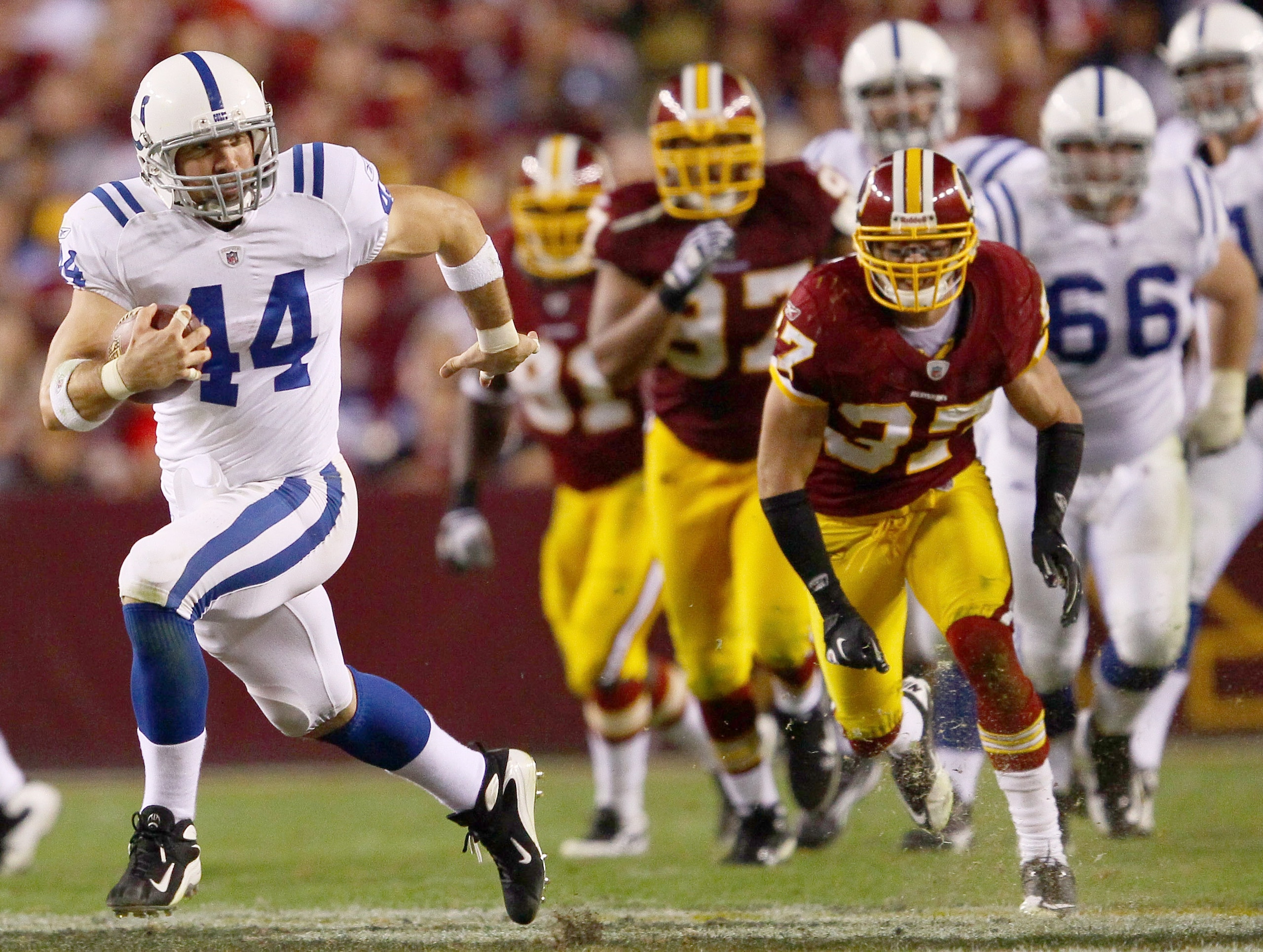 LANDOVER, MD - OCTOBER 17: Dallas Clark #44 of the Indianapolis Colts picks up yards after a reception against the Washington Redskins at FedExField on October 17, 2010 in Landover, Maryland. The Colts won the game 27-24.  (Photo by Win McNamee/Getty Imag