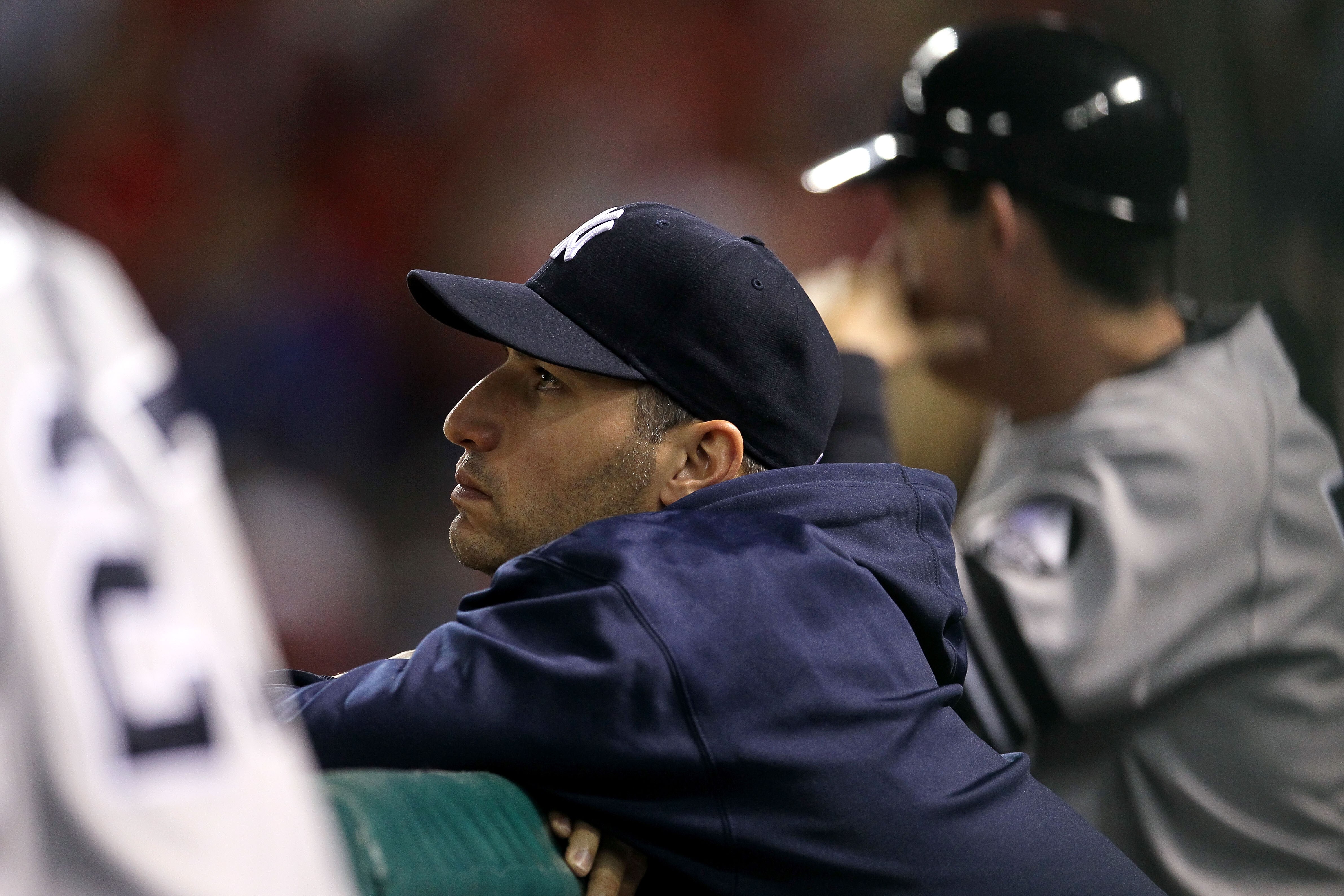 ARLINGTON, TX - OCTOBER 22:  Andy Pettitte #46 of the New York Yankees looks on from the dugout late in the game against the Texas Rangers in Game Six of the ALCS during the 2010 MLB Playoffs at Rangers Ballpark in Arlington on October 22, 2010 in Arlingt