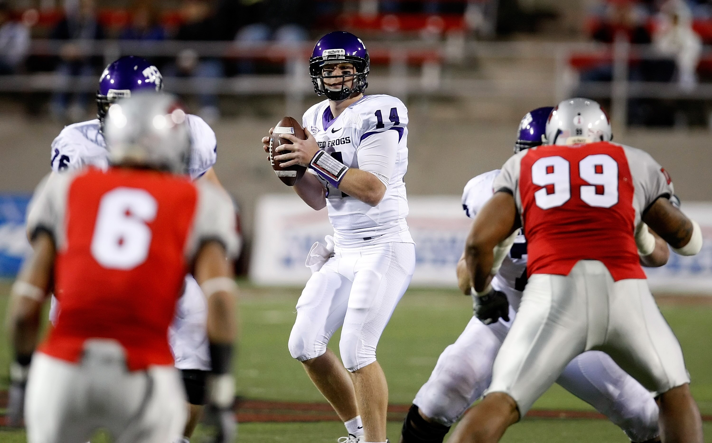 LAS VEGAS - OCTOBER 30:  Quarterback Andy Dalton #14 of the Texas Christian University Horned Frogs looks to pass against the UNLV Rebels at Sam Boyd Stadium October 30, 2010 in Las Vegas, Nevada. TCU won 48-6.  (Photo by Ethan Miller/Getty Images)
