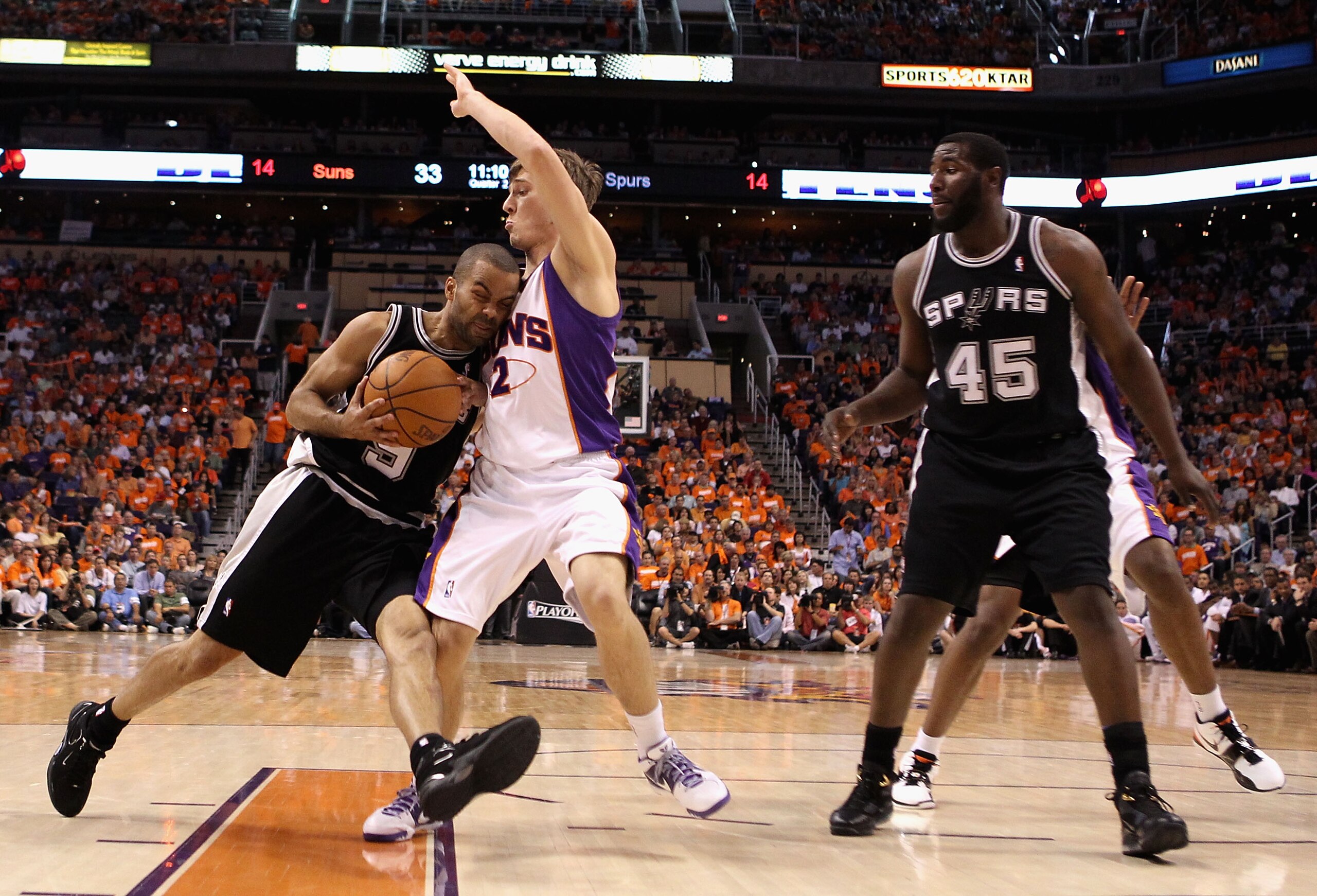 PHOENIX - MAY 03:  Tony Parker #9 of the San Antonio Spurs drives the ball against Goran Dragic #2 of the Phoenix Suns during Game One of the Western Conference Semifinals of the 2010 NBA Playoffs at US Airways Center on May 3, 2010 in Phoenix, Arizona. N