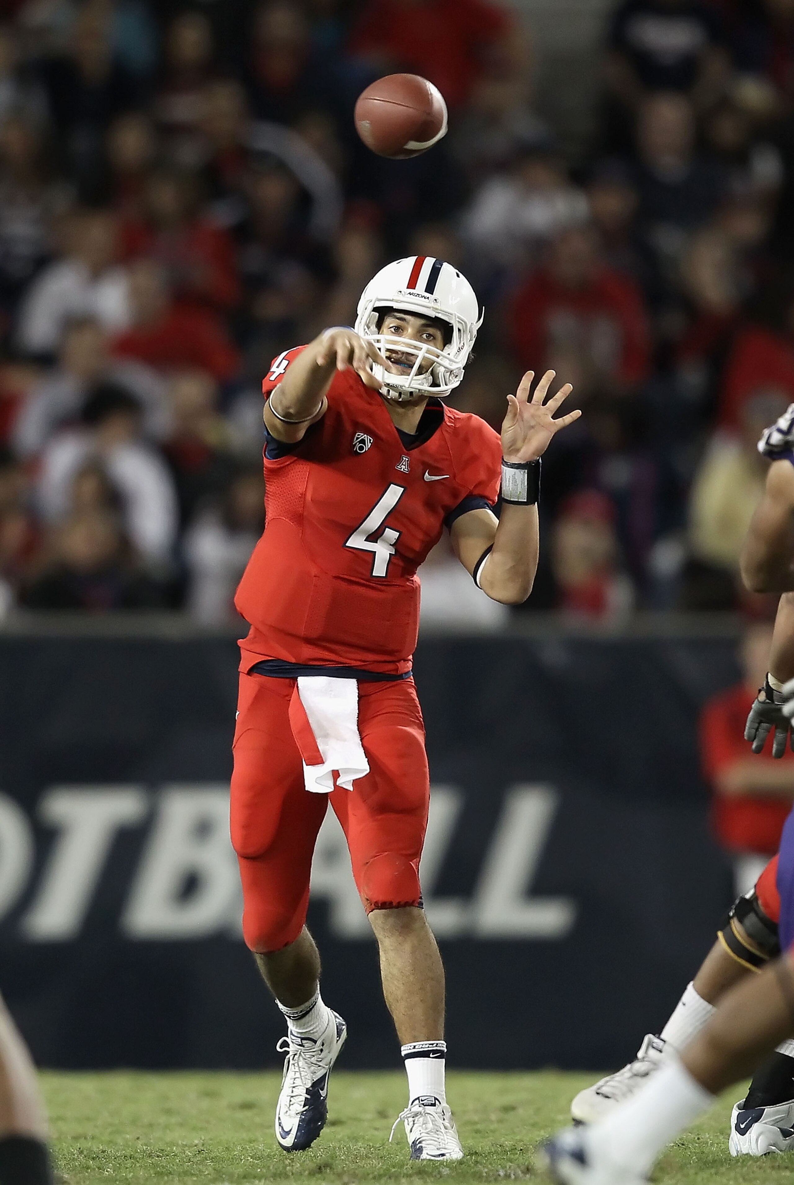 TUCSON, AZ - OCTOBER 23:  Quarterback Matt Scott #4 of the Arizona Wildcats throws a pass during the college football game against the Washington Huskies at Arizona Stadium on October 23, 2010 in Tucson, Arizona.  (Photo by Christian Petersen/Getty Images
