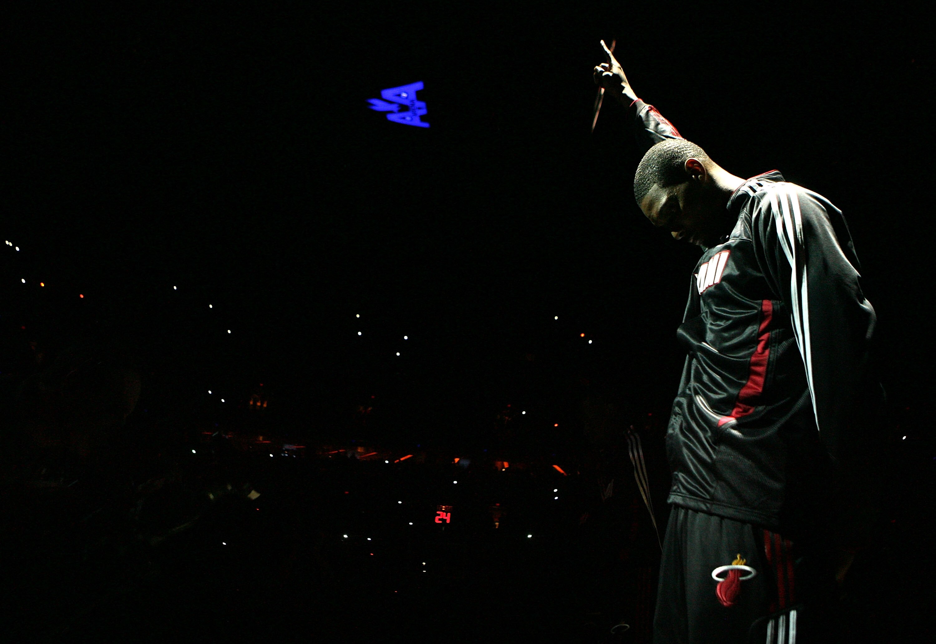 MIAMI - OCTOBER 29:  Forward Chris Bosh #1 of the Miami Heat is introduced against the Orlando Magic at American Airlines Arena on October 29, 2010 in Miami, Florida.  NOTE TO USER: User expressly acknowledges and agrees that, by downloading and or using