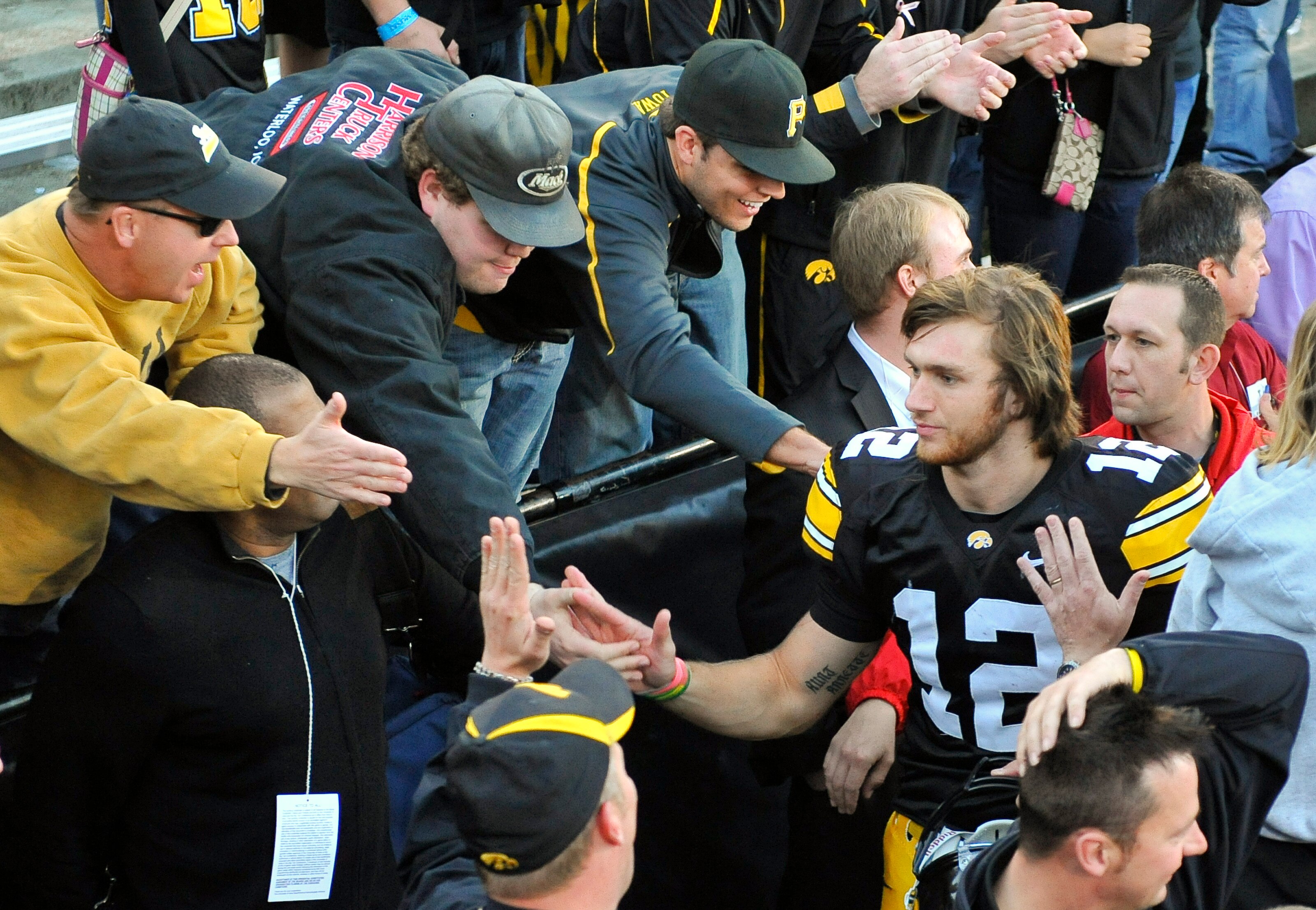 IOWA CITY, IA - OCTOBER 30: Quarterback Ricky Stanzi #12 acknowledges fans after the University of Iowa Hawkeyes tackles defeated the Michigan State Spartans at Kinnick Stadium on October 30, 2010 in Iowa City, Iowa. Iowa won 37-6 over Michigan State. (Ph