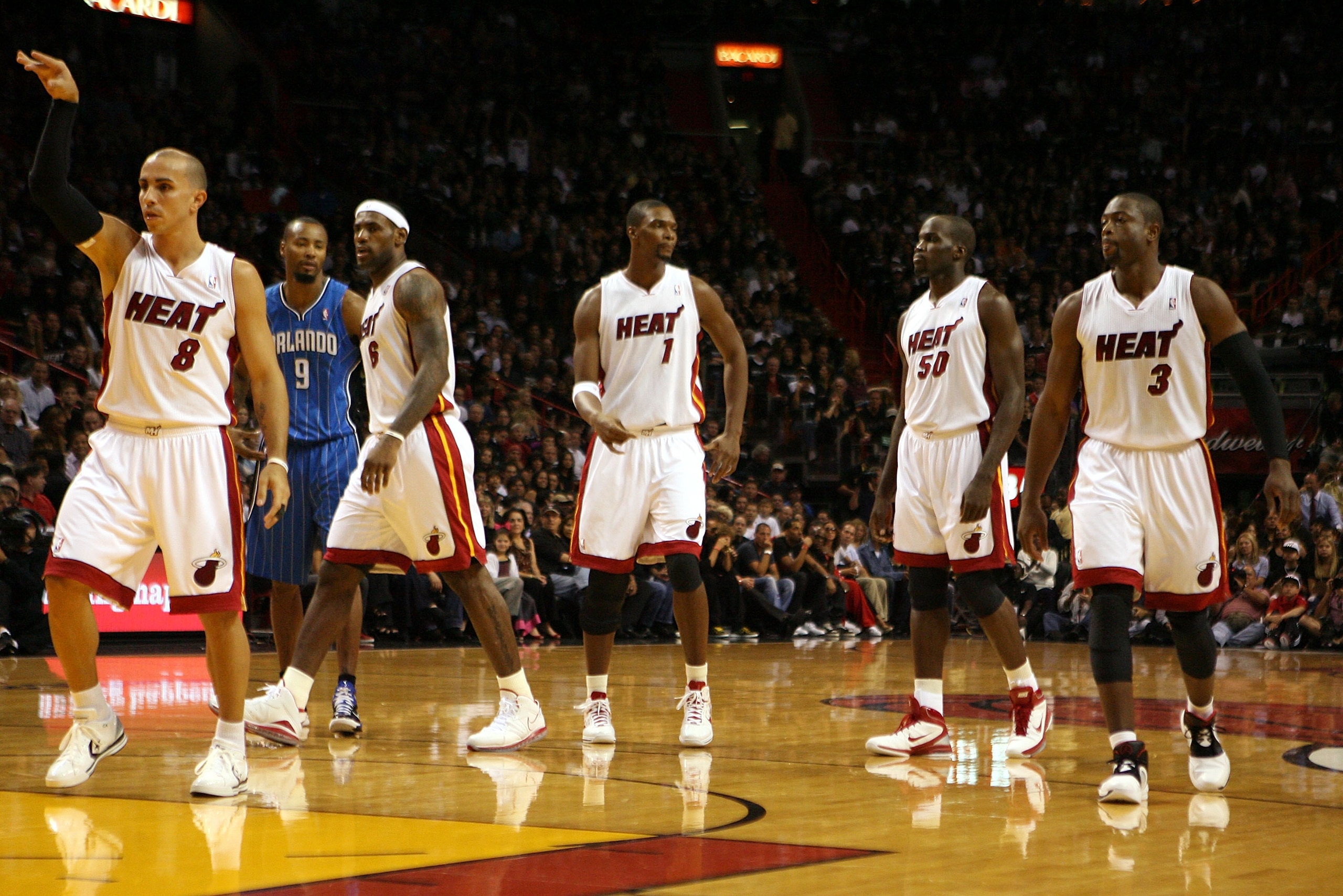 MIAMI - OCTOBER 29:  Starting five guard Carlos Arroyo #8, Forward LeBron James #6, Forard Chris Bosh #1, Center Joel Anthony #55 and Dwyane Wade #3 of the Miami Heat take on the Orlando Magic at American Airlines Arena on October 29, 2010 in Miami, Flori