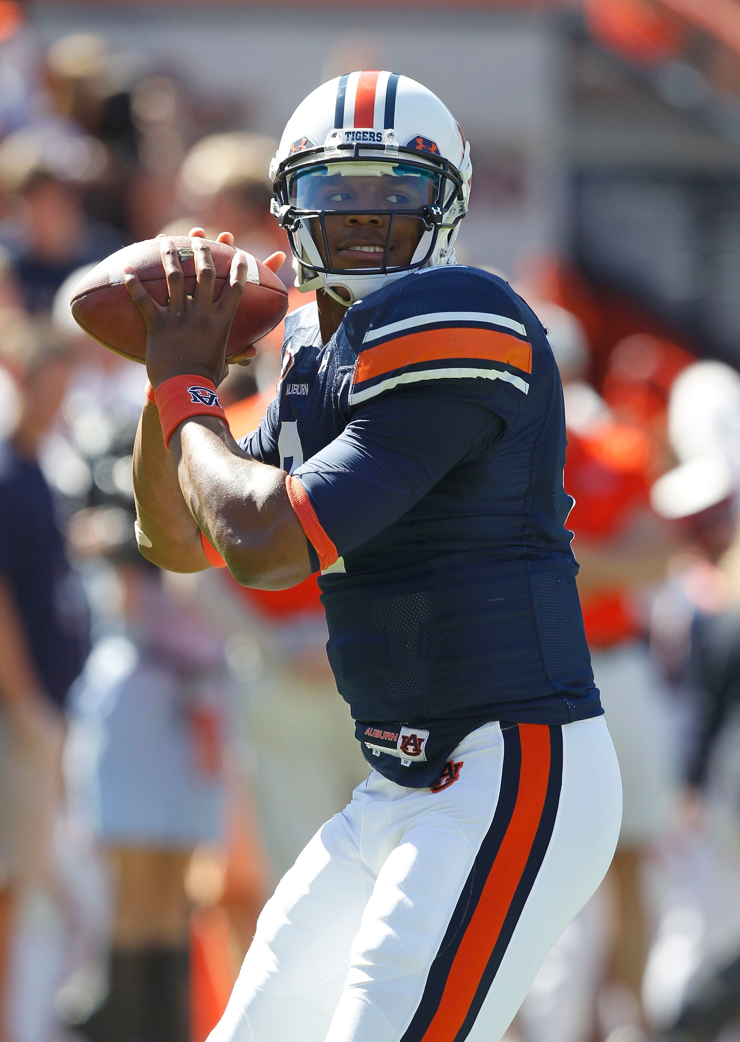AUBURN, AL - OCTOBER 16: Quarterback Cam Newton #2 of the Auburn Tigers throws a practice pass before the game against the Arkansas Razorbacks at Jordan-Hare Stadium on October 16, 2010 in Auburn, Alabama. (Photo by Mike Zarrilli/Getty Images) AUBURN, AL - OCTOBER 16: Quarterback Cam Newton #2 of the Auburn Tigers throws a practice pass before the game against the Arkansas Razorbacks at Jordan-Hare Stadium on October 16, 2010 in Auburn, Alabama. (Photo by Mike Zarrilli/Getty Images)