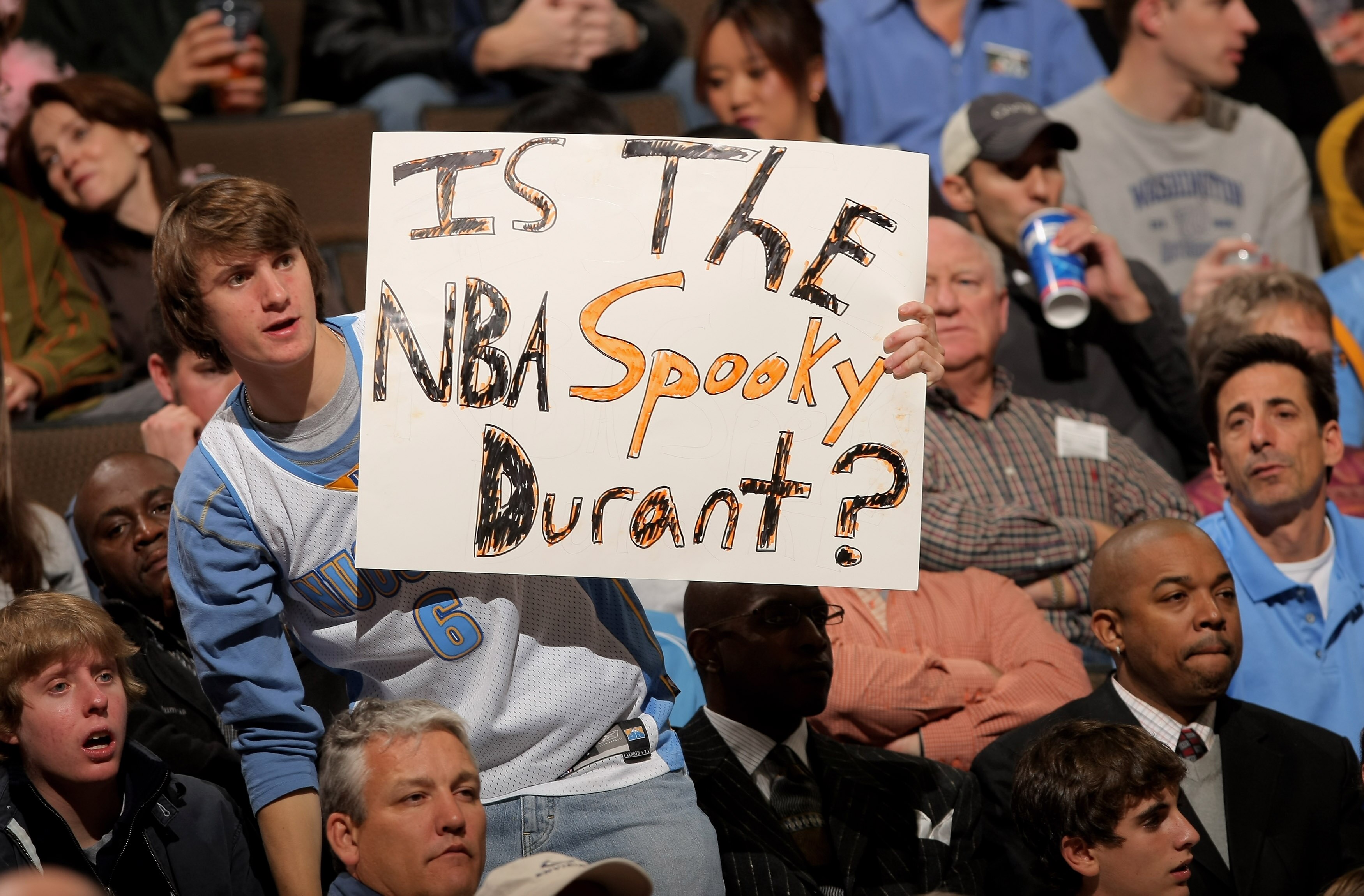 DENVER - OCTOBER 31: A fan poses a question to Kevin Durant #35 of the Seattle SuperSonics as he makes his NBA debut against the Denver Nuggets on Halloween at the Pepsi Center on October 31, 2007 in Denver, Colorado. NOTE TO USER: User expressly acknowle