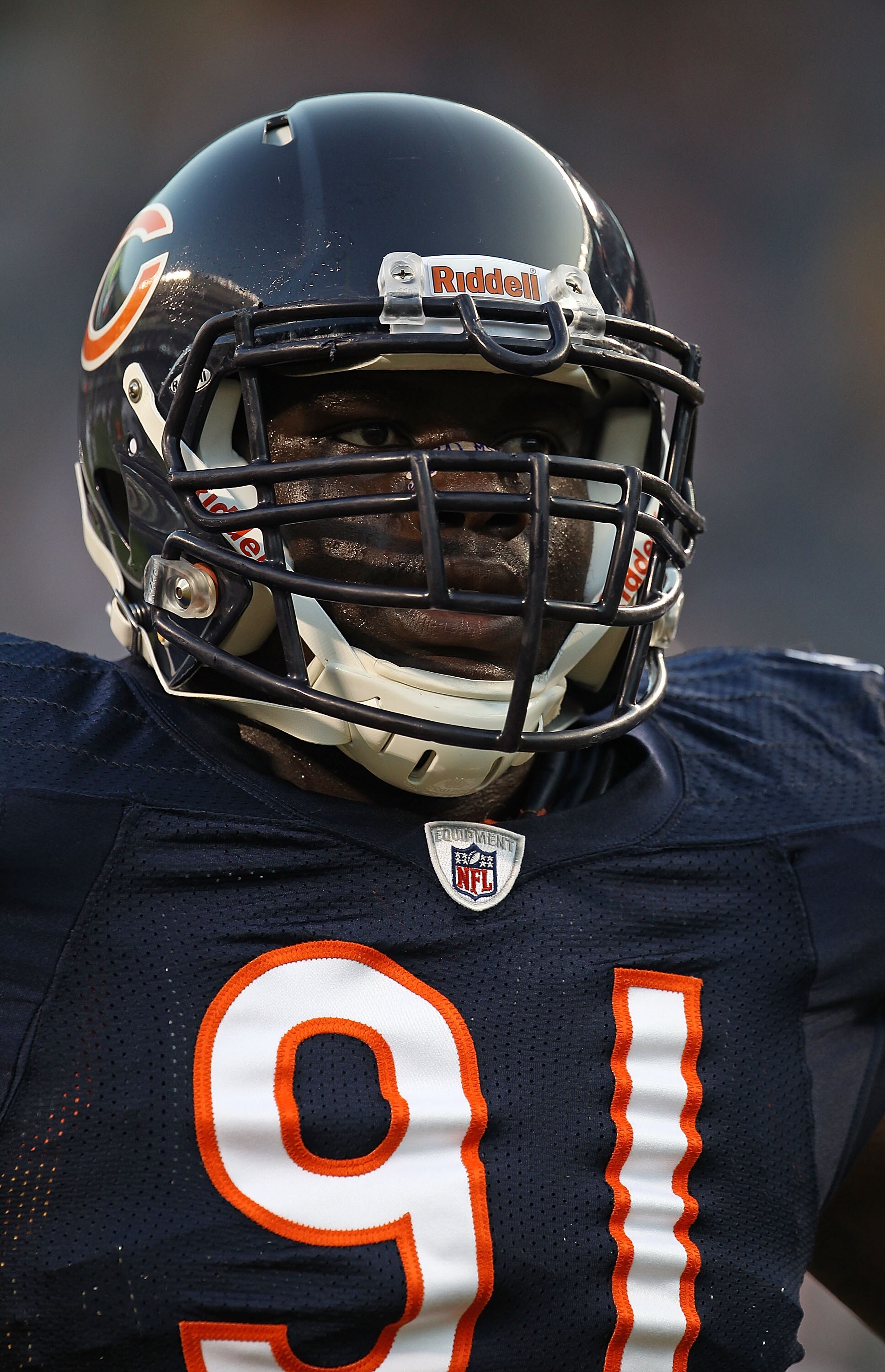 CHICAGO - AUGUST 21: Tommie Harris #91 of the Chicago Bears warms-up before a preseason game against the Oakland Raiders at Soldier Field on August 21, 2010 in Chicago, Illinois. The Raiders defeated the Bears 32-17. (Photo by Jonathan Daniel/Getty Images