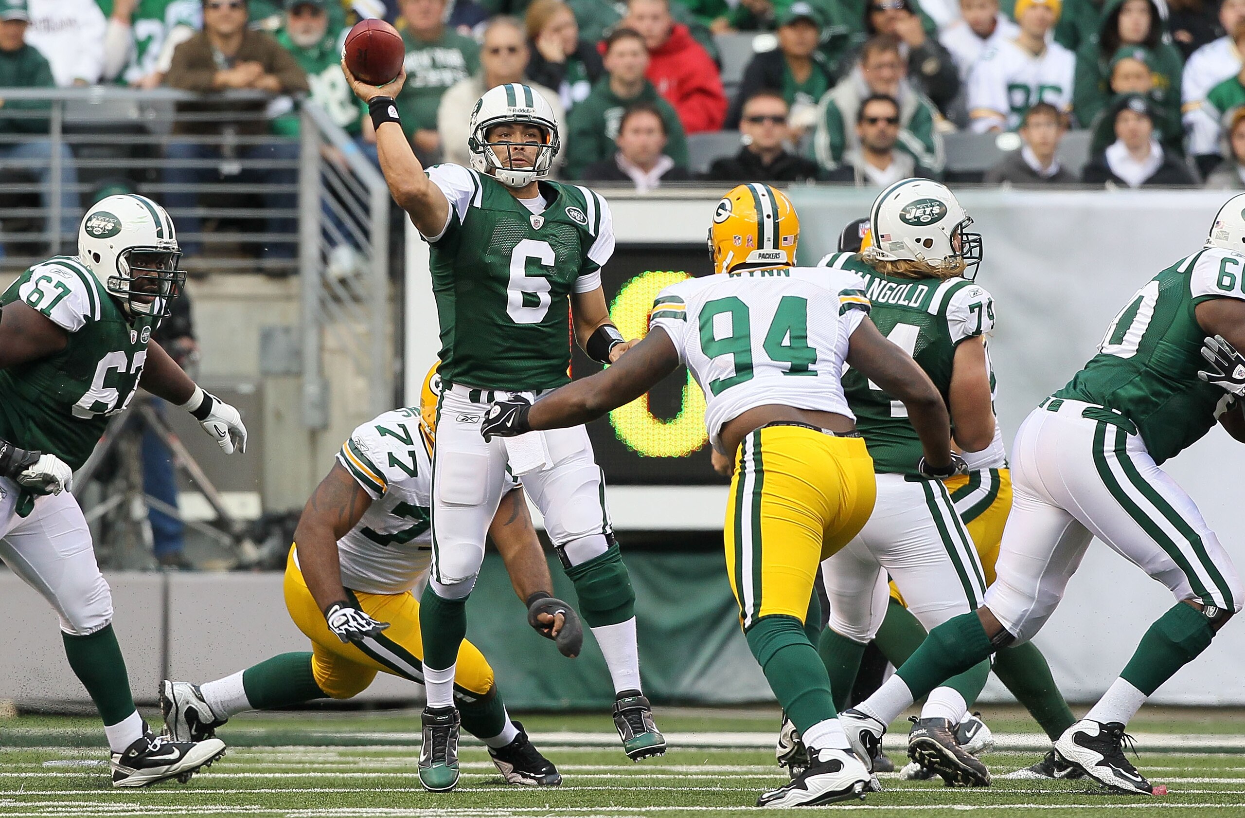 EAST RUTHERFORD, NJ - OCTOBER 31: Mark Sanchez #6 of the New York Jets throws a pass against the Green Bay Packers on October 31, 2010 at the New Meadowlands Stadium in East Rutherford, New Jersey. The Packers defeated the Jets 9-0. (Photo by Jim McIsaac/