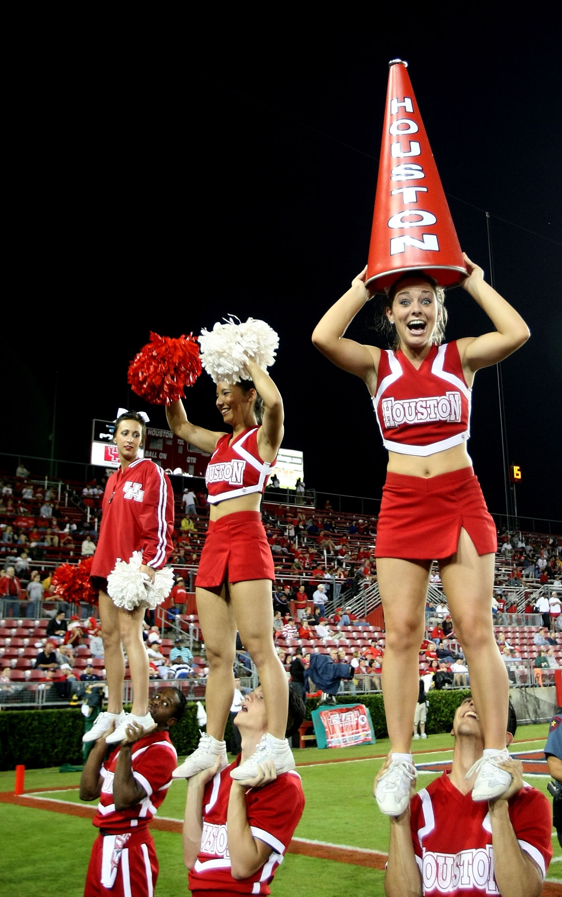HOUSTON - NOVEMBER 17: The Houston Cougars cheerleaders perform during a game against the Marshall Thundering Herd at Robertson Stadium November 17, 2007 in Houston, Texas. Houston won 35-28.  (Photo by Stephen Dunn/Getty Images)
