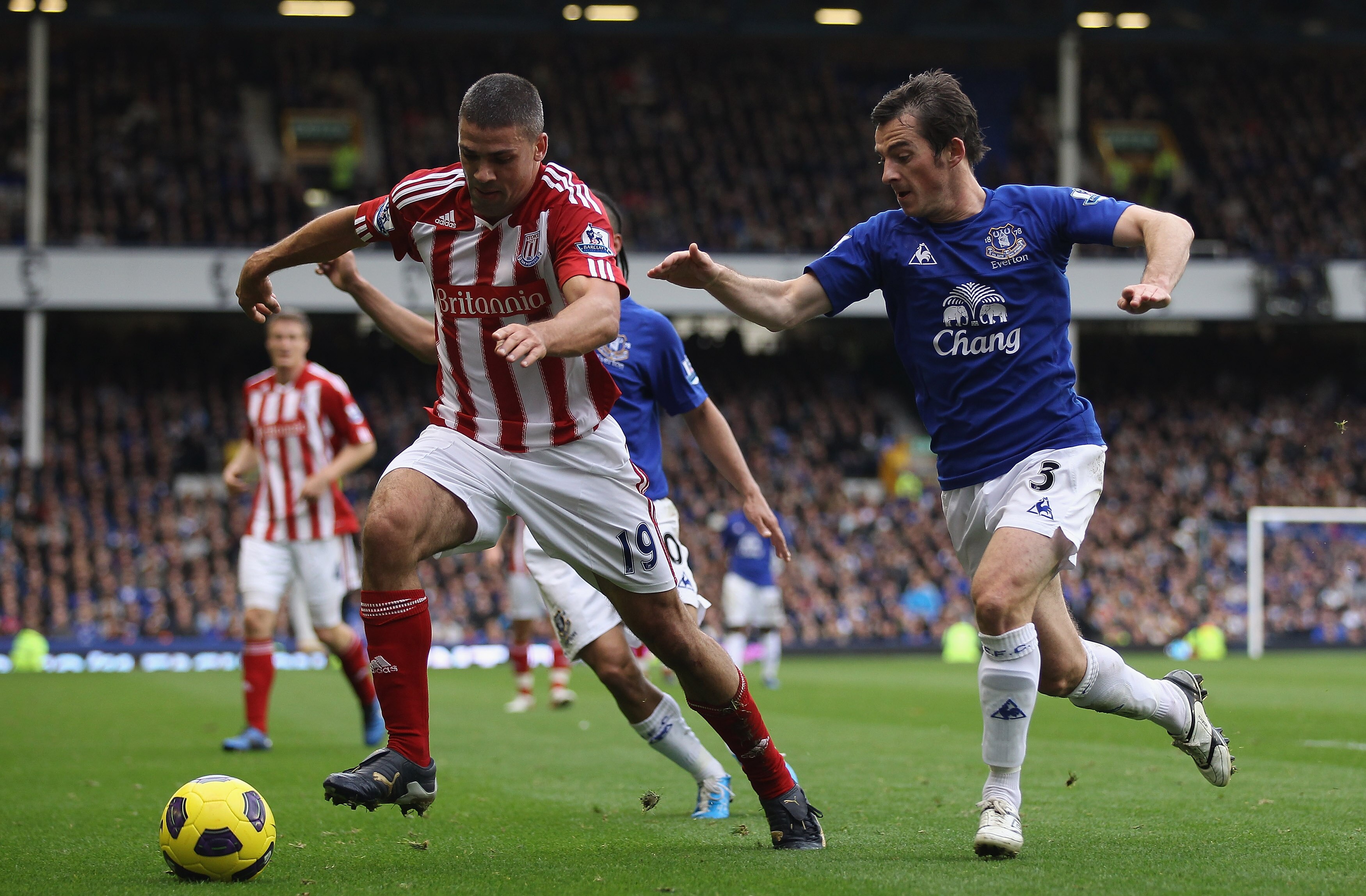 LIVERPOOL, ENGLAND - OCTOBER 30:  Jonathan Walters of Stoke City moves away from a challenge by Leighton Baines of Everton during the Barclays Premier League match between Everton and Stoke City at Goodison Park on October 30, 2010 in Liverpool, England.