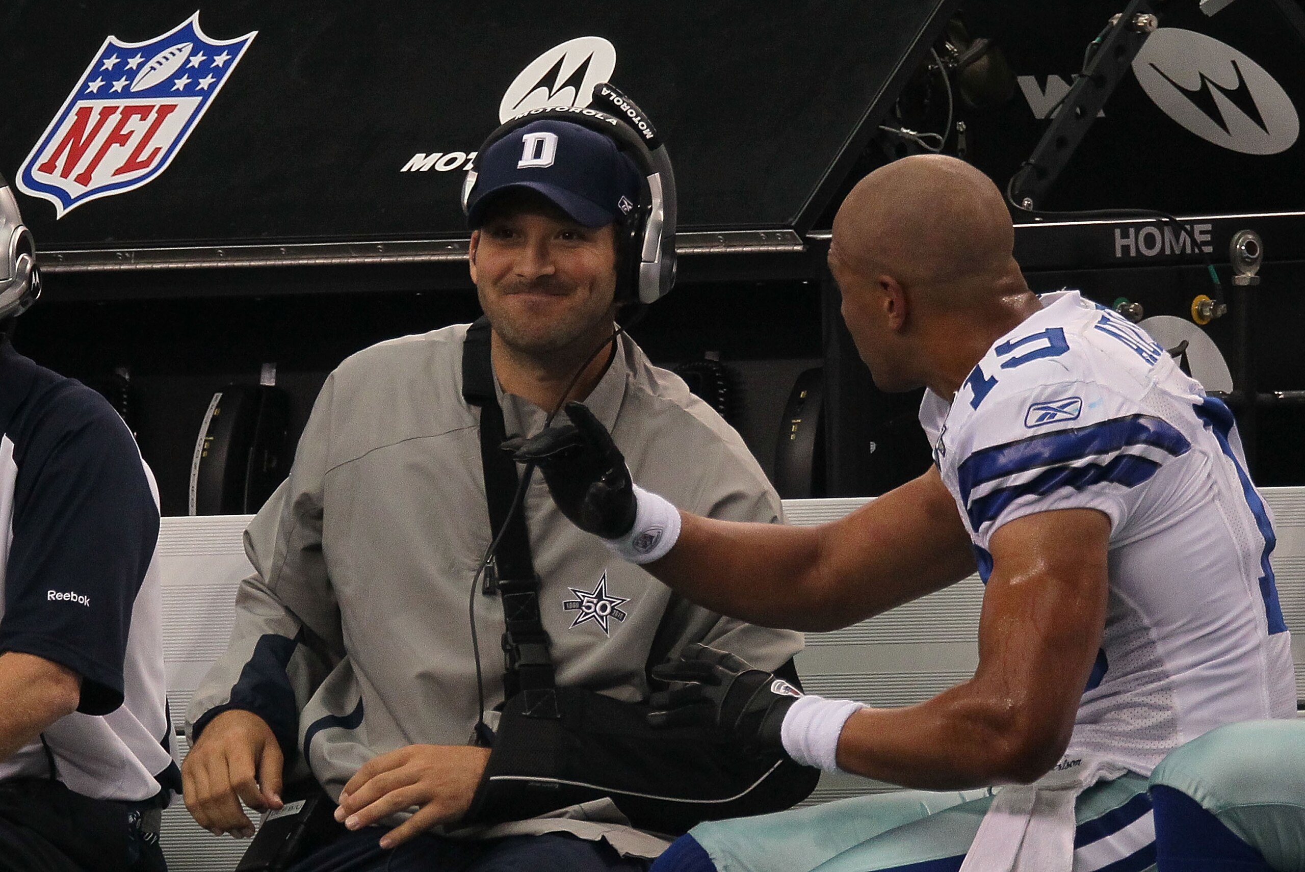 ARLINGTON, TX - OCTOBER 31: Quarterback Tony Romo #9 talks with Miles Austin #19 of the Dallas Cowboys on the sidelines during a game against the Jacksonville Jaguars at Cowboys Stadium on October 31, 2010 in Arlington, Texas. (Photo by Stephen Dunn/Get ARLINGTON, TX - OCTOBER 31: Quarterback Tony Romo #9 talks with Miles Austin #19 of the Dallas Cowboys on the sidelines during a game against the Jacksonville Jaguars at Cowboys Stadium on October 31, 2010 in Arlington, Texas. (Photo by Stephen Dunn/Get