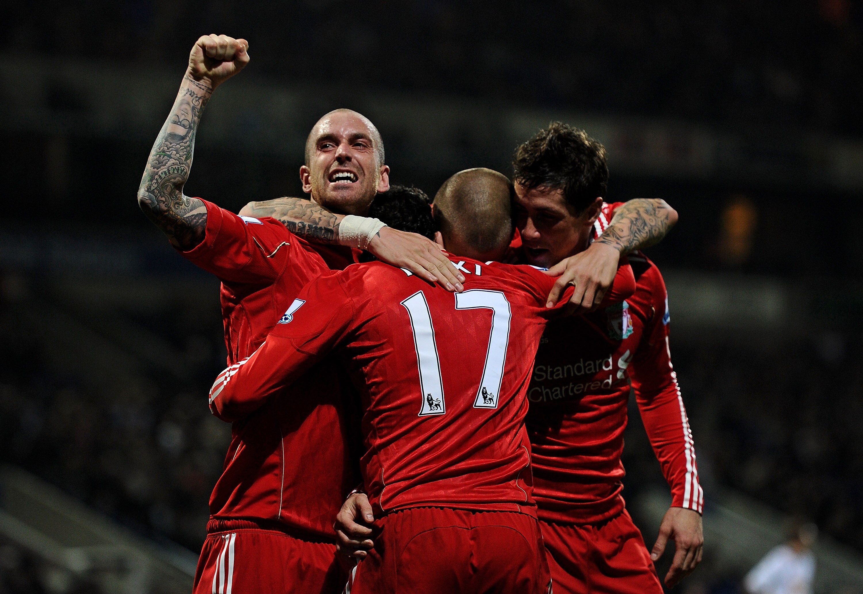 BOLTON, ENGLAND - OCTOBER 31:  Maxi Rodriguez of Liverpool celebrates with his team mates after he scored the winning goal during the Barclays Premier League match between Bolton Wanderers and Liverpool at the Reebok Stadium on October 31, 2010 in Bolton,