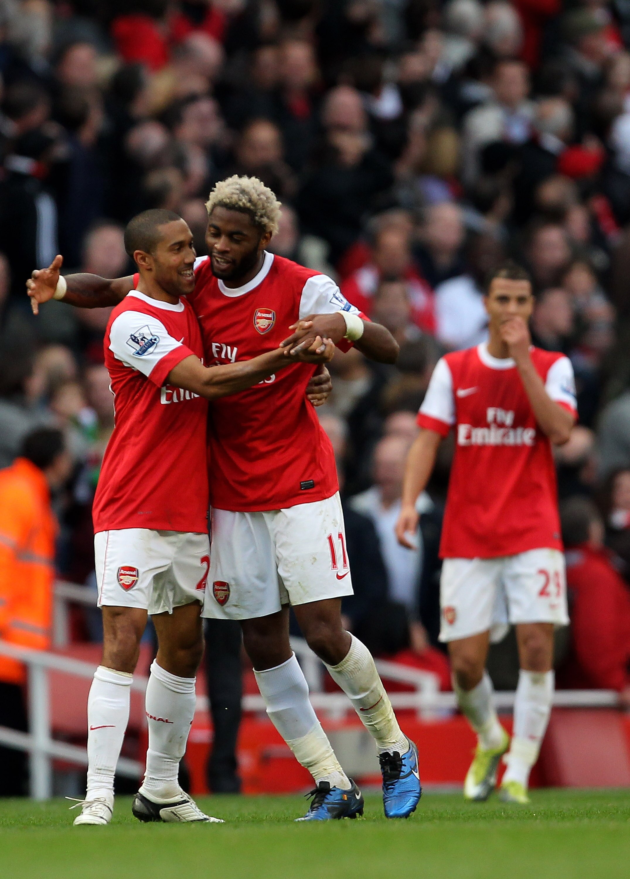 LONDON, ENGLAND - OCTOBER 30:  Alex Song of Arsenal is congratulated on scoring by team mate Gael Clichy during the Barclays Premier League match between Arsenal and West Ham United at Emirates Stadium on October 30, 2010 in London, England.  (Photo by Cl