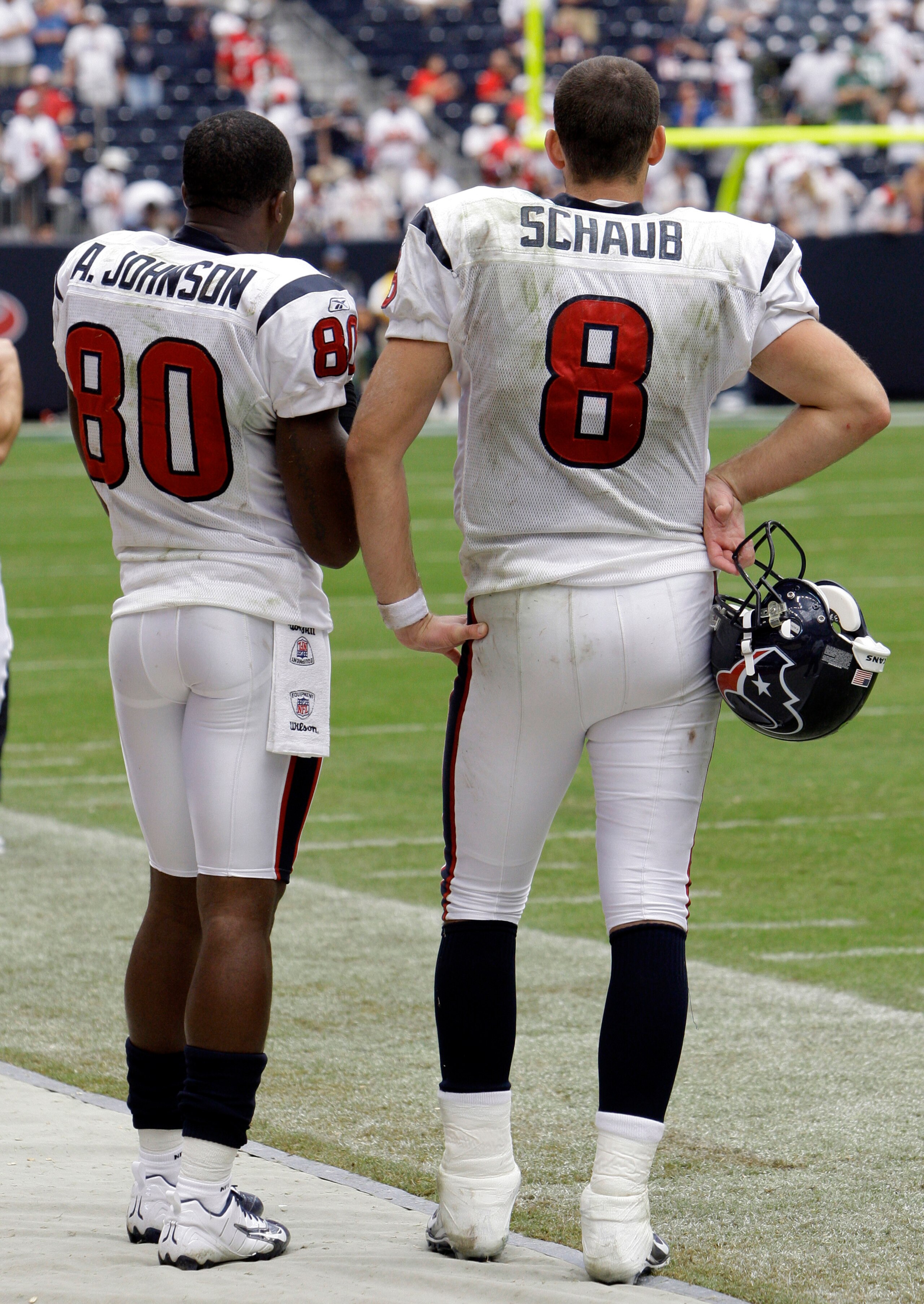 HOUSTON - SEPTEMBER 13:  Wide receiver Andre Johnson #80 and quarterback Matt Schaub of the Houston Texans watch the final moments from the sidelines at Reliant Stadium on September 13, 2009 in Houston, Texas.  (Photo by Bob Levey/Getty Images)