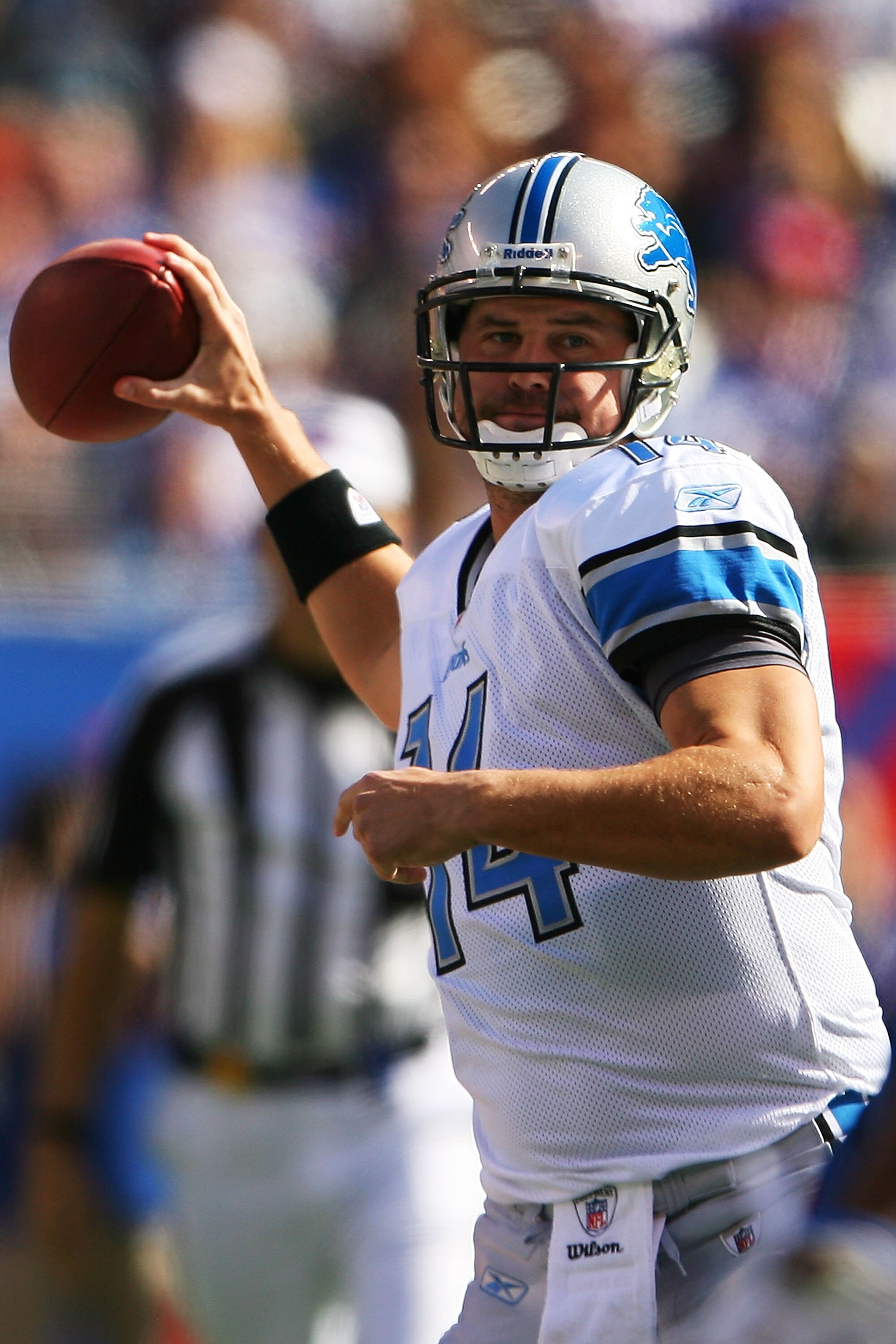 EAST RUTHERFORD, NJ - OCTOBER 17:  Shaun Hill #14 of the Detroit Lions drops back to pass against the New York Giants at New Meadowlands Stadium on October 17, 2010 in East Rutherford, New Jersey.  (Photo by Andrew Burton/Getty Images)
