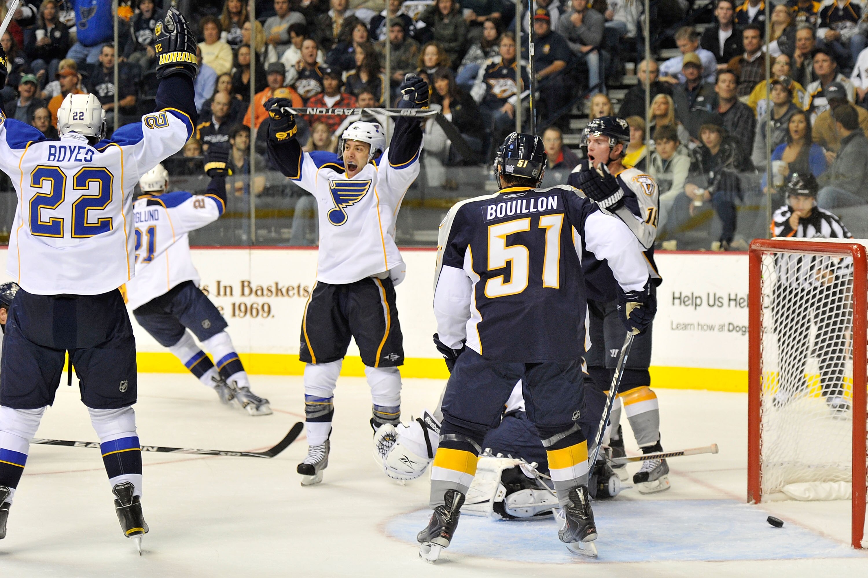 NASHVILLE, TN - OCTOBER 28:  Andy McDonald #10 and Brad Boyes #22 of the St. Louis Blues celebrate a goal against Francis Bouillon #51 and the Nashville Predators at the Bridgestone Arena on October 28, 2010 in Nashville, Tennessee.  (Photo by Frederick B