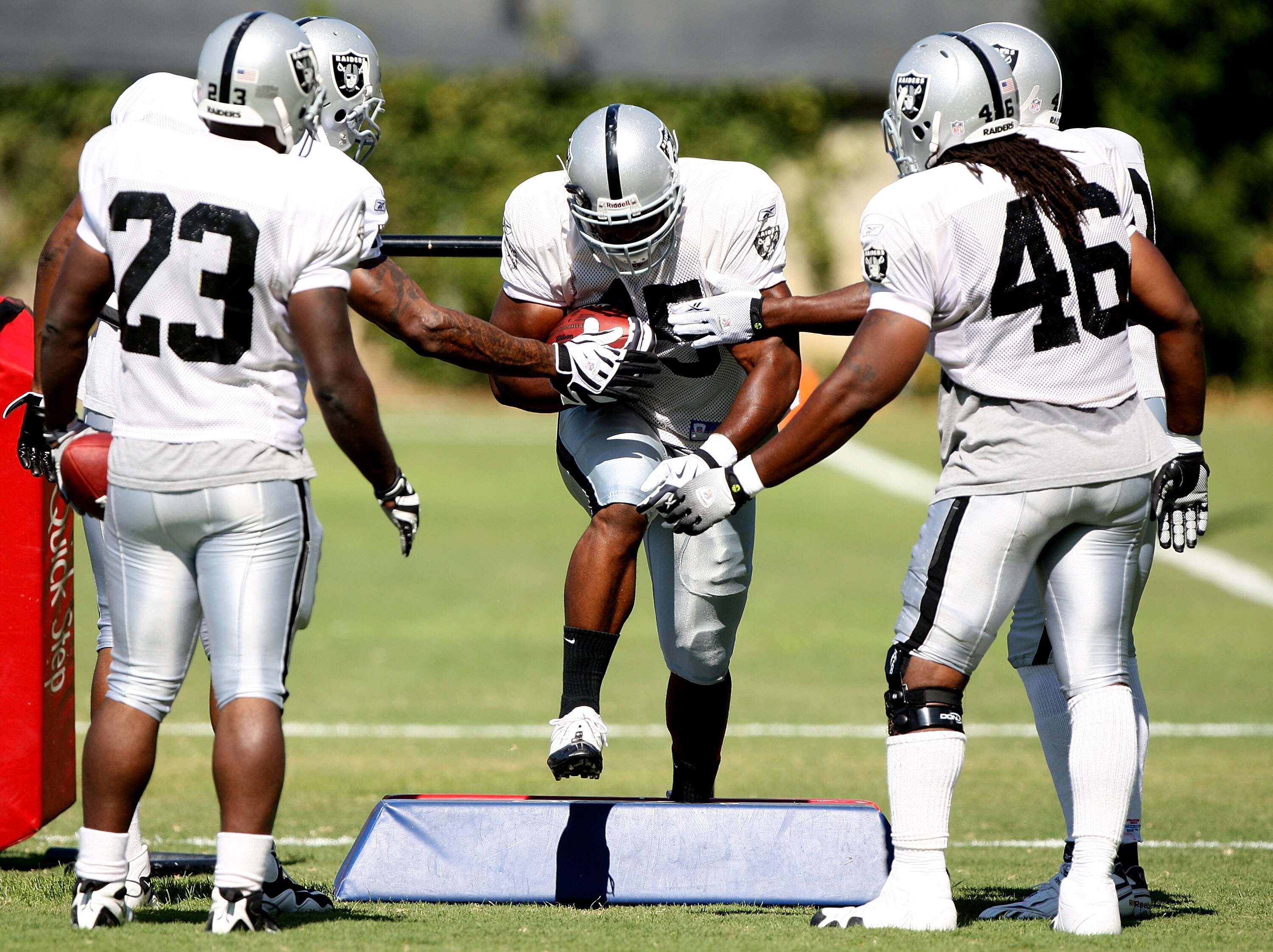 NAPA, CA - AUGUST 05: Marcel Reece #45 runs with the ball during the Oakland Raiders Training Camp at the Napa Valley Marriott on August 5, 2009 in Napa, California.  (Photo by Jed Jacobsohn/Getty Images)