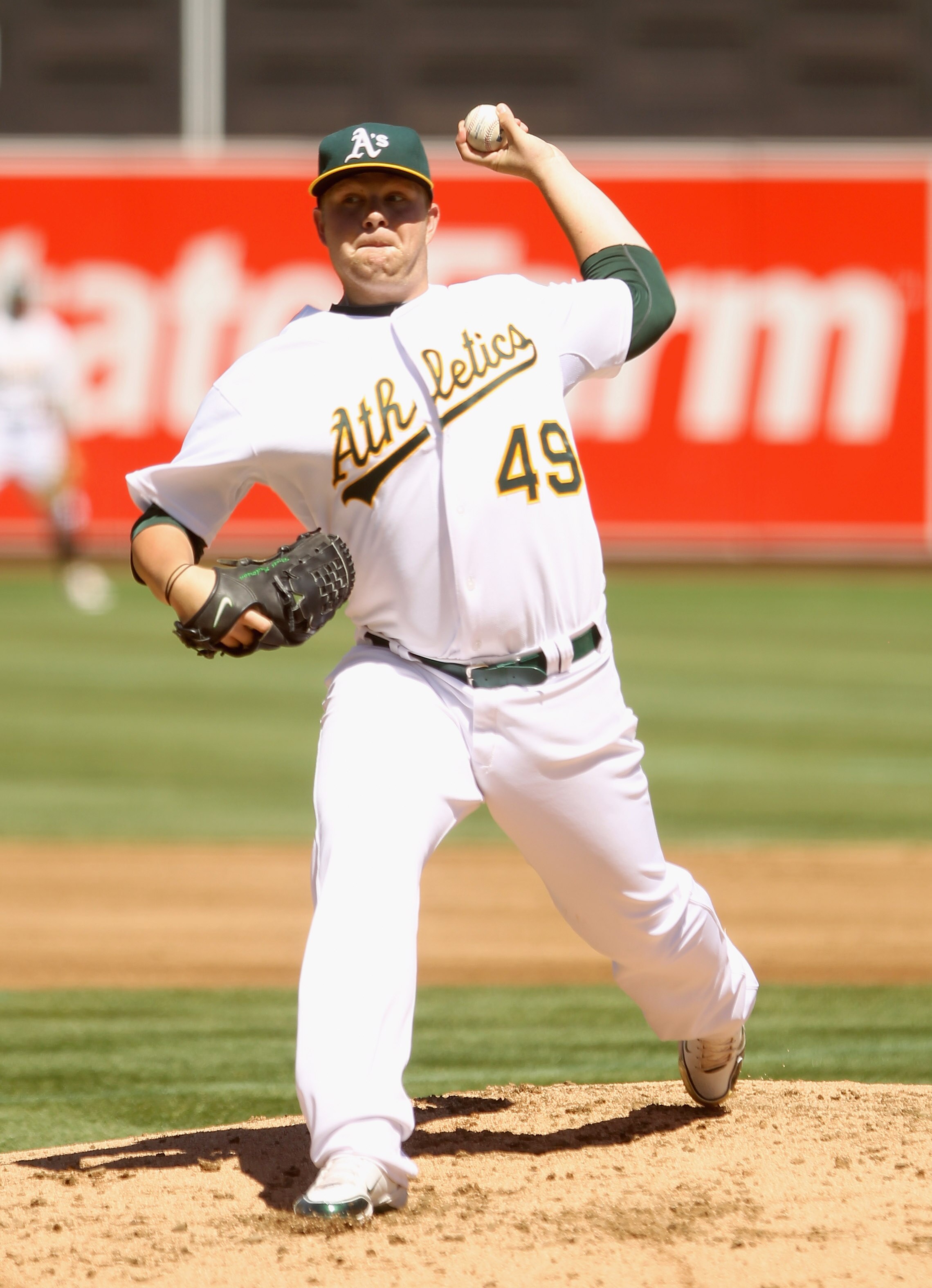OAKLAND, CA - SEPTEMBER 06:  Brett Anderson #49 of the Oakland Athletics pitches against the Seattle Mariners at the Oakland-Alameda County Coliseum  on September 6, 2010 in Oakland, California.  (Photo by Ezra Shaw/Getty Images)