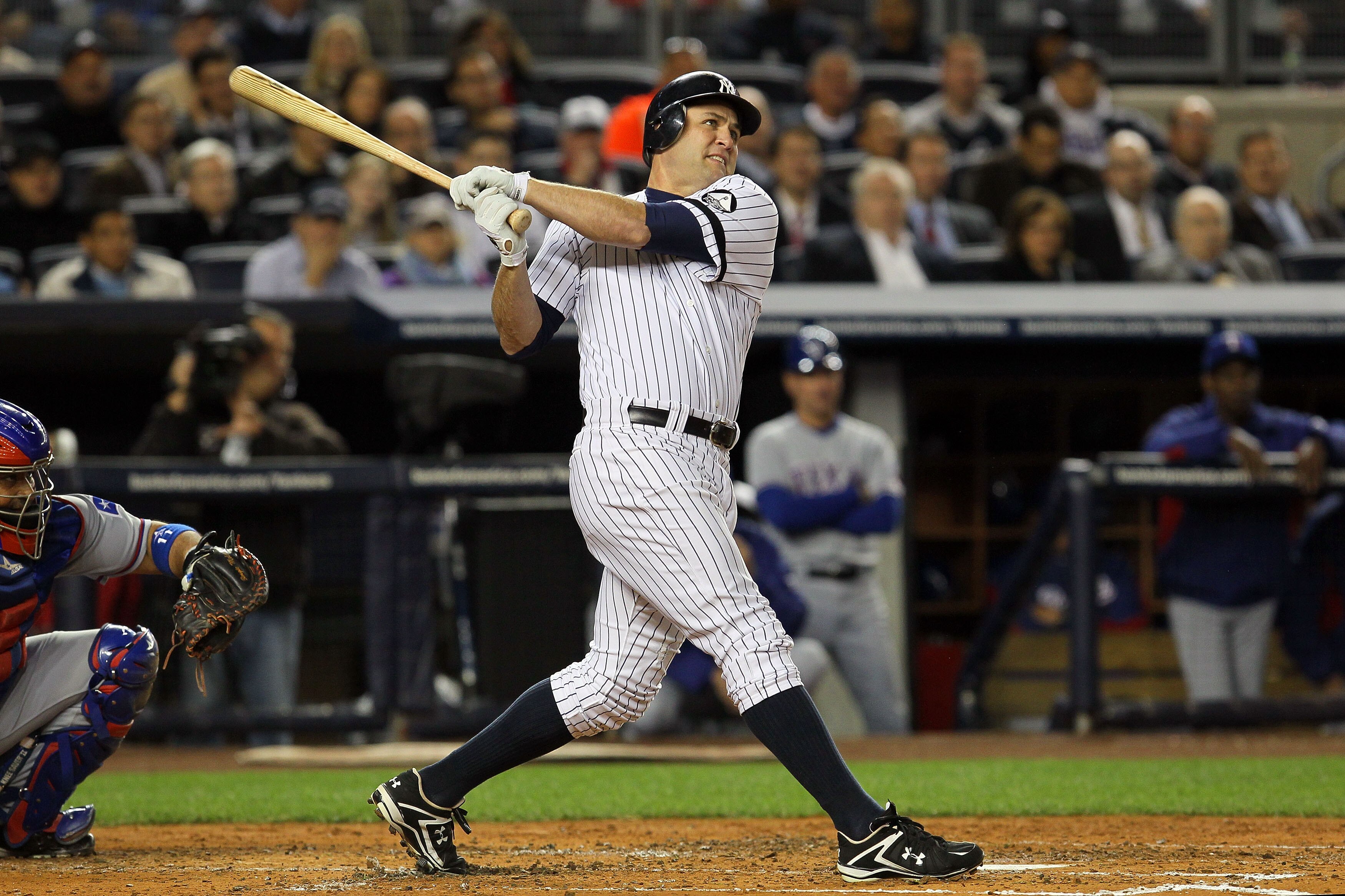 NEW YORK - OCTOBER 19:  Lance Berkman #17 of the New York Yankees hits a foul ball that was thought to be a homerun in the second inning against the Texas Rangers in Game Four of the ALCS during the 2010 MLB Playoffs at Yankee Stadium on October 19, 2010