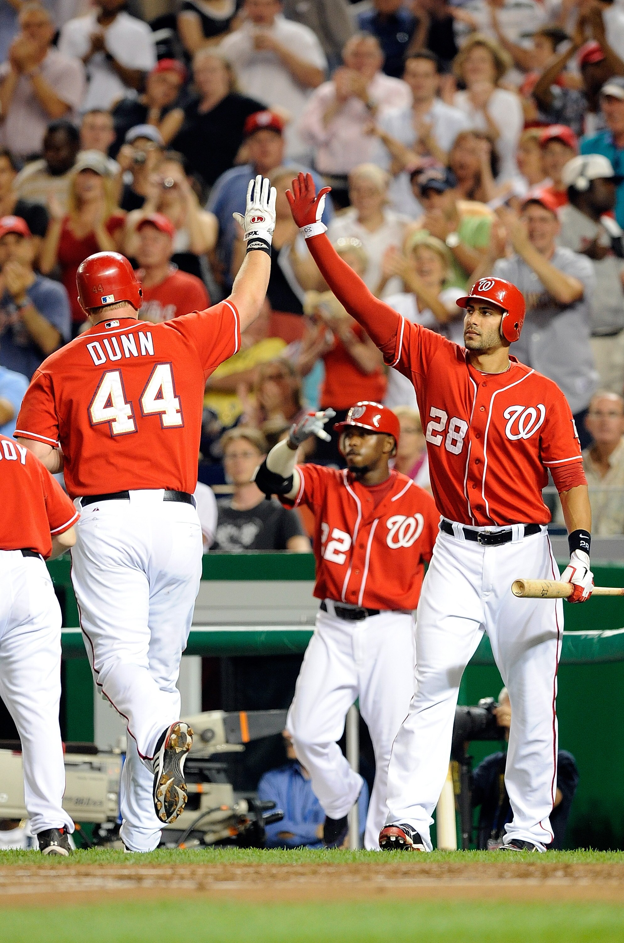 WASHINGTON - SEPTEMBER 24:  Adam Dunn #44 of the Washington Nationals is congratulated by Michael Morse #28 after hitting a home run in the second inning against the Atlanta Braves at Nationals Park on September 24, 2010 in Washington, DC.  (Photo by Greg