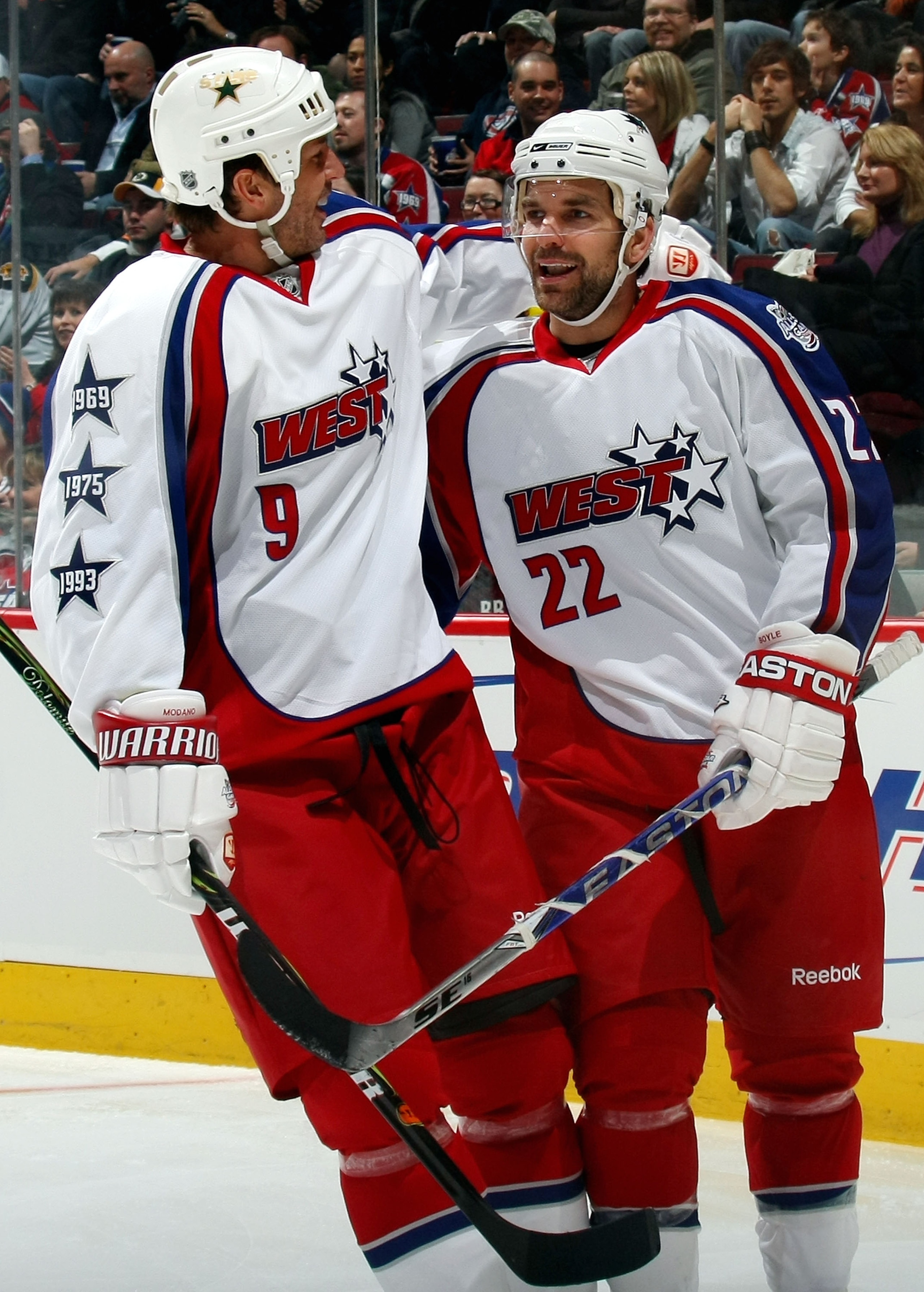 MONTREAL - JANUARY 25:  Western Conference All-Star Dan Boyle of the San Jose Sharks and Mike Modano of the Dallas Stars  celebrate after a goal during the 2009 NHL All-Star game at the Bell Centre on January 25, 2009 in Montreal, Canada.  (Photo by Bruce