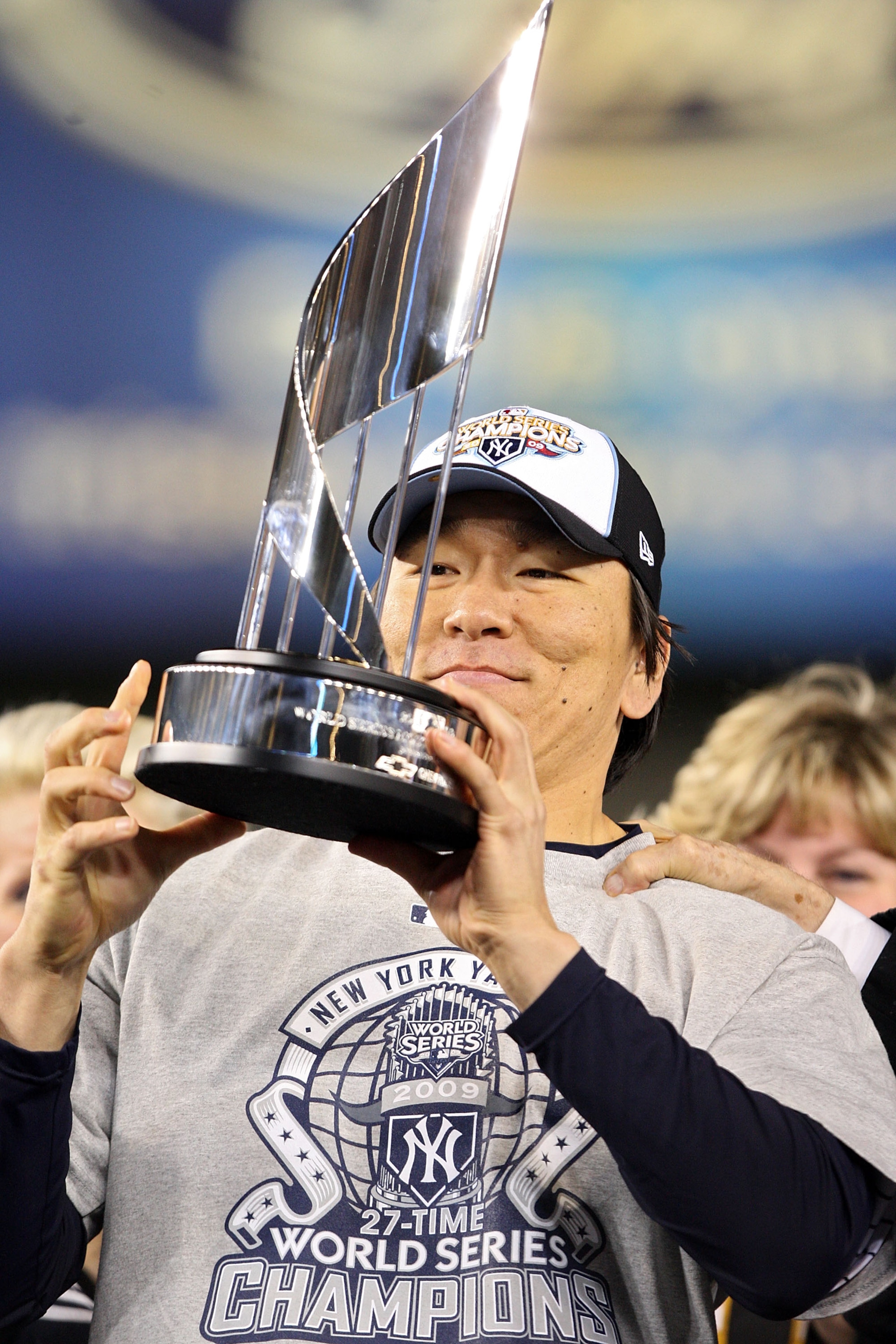 NEW YORK - NOVEMBER 04:  World Series MVP Hideki Matsui #55 of the New York Yankees celebrates with the MVP trophy after their 7-3 win against the Philadelphia Phillies in Game Six of the 2009 MLB World Series at Yankee Stadium on November 4, 2009 in the