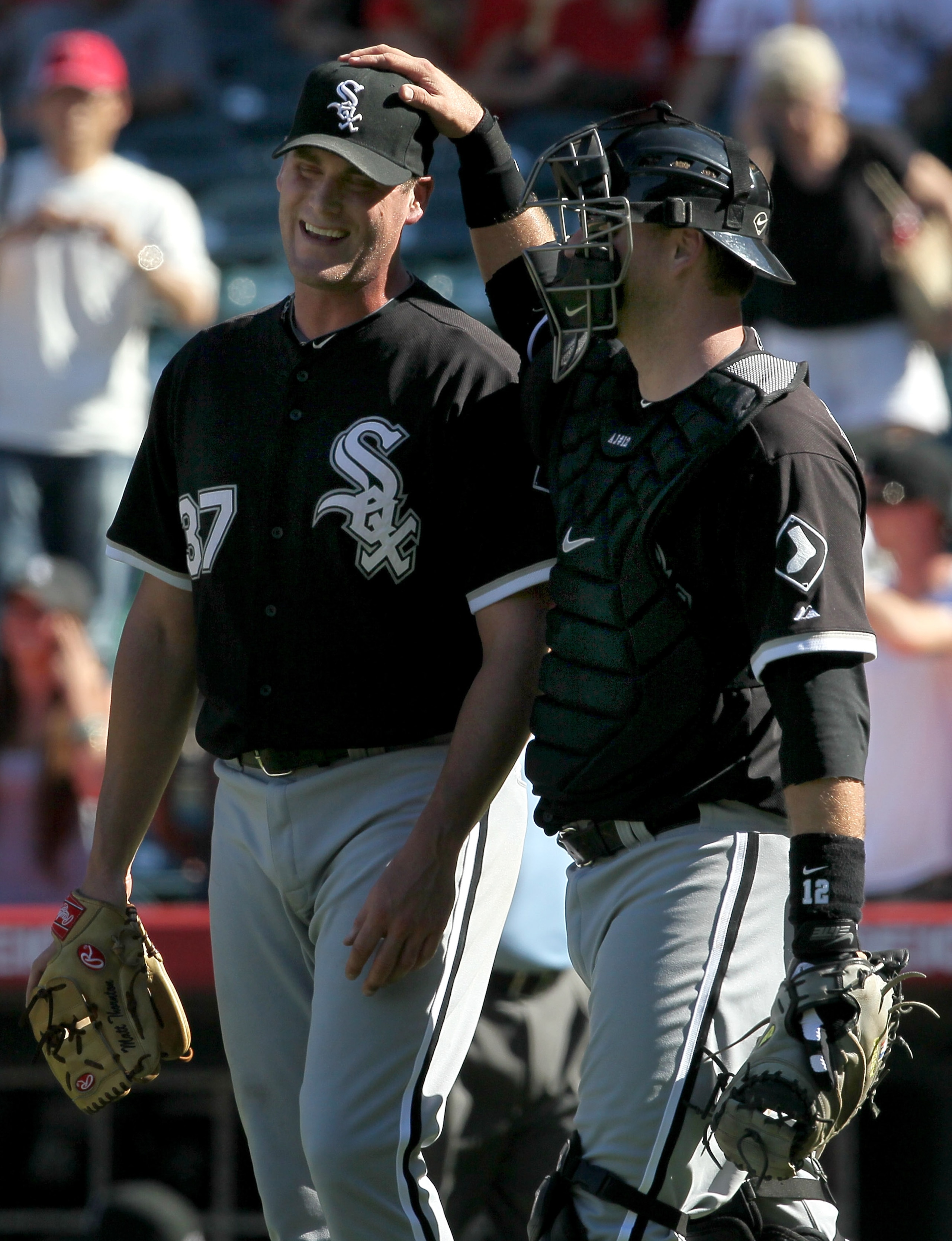 ANAHEIM, CA - SEPTEMBER 26: Pitcher Matt Thornton #37 of the Chicago White Sox is greeted by catcher A.J. Pierzynski #12 after picking up the save against the Los Angeles Angels of Anaheim on September 26, 2010 at Angel Stadium in Anaheim, California. Th ANAHEIM, CA - SEPTEMBER 26: Pitcher Matt Thornton #37 of the Chicago White Sox is greeted by catcher A.J. Pierzynski #12 after picking up the save against the Los Angeles Angels of Anaheim on September 26, 2010 at Angel Stadium in Anaheim, California. Th