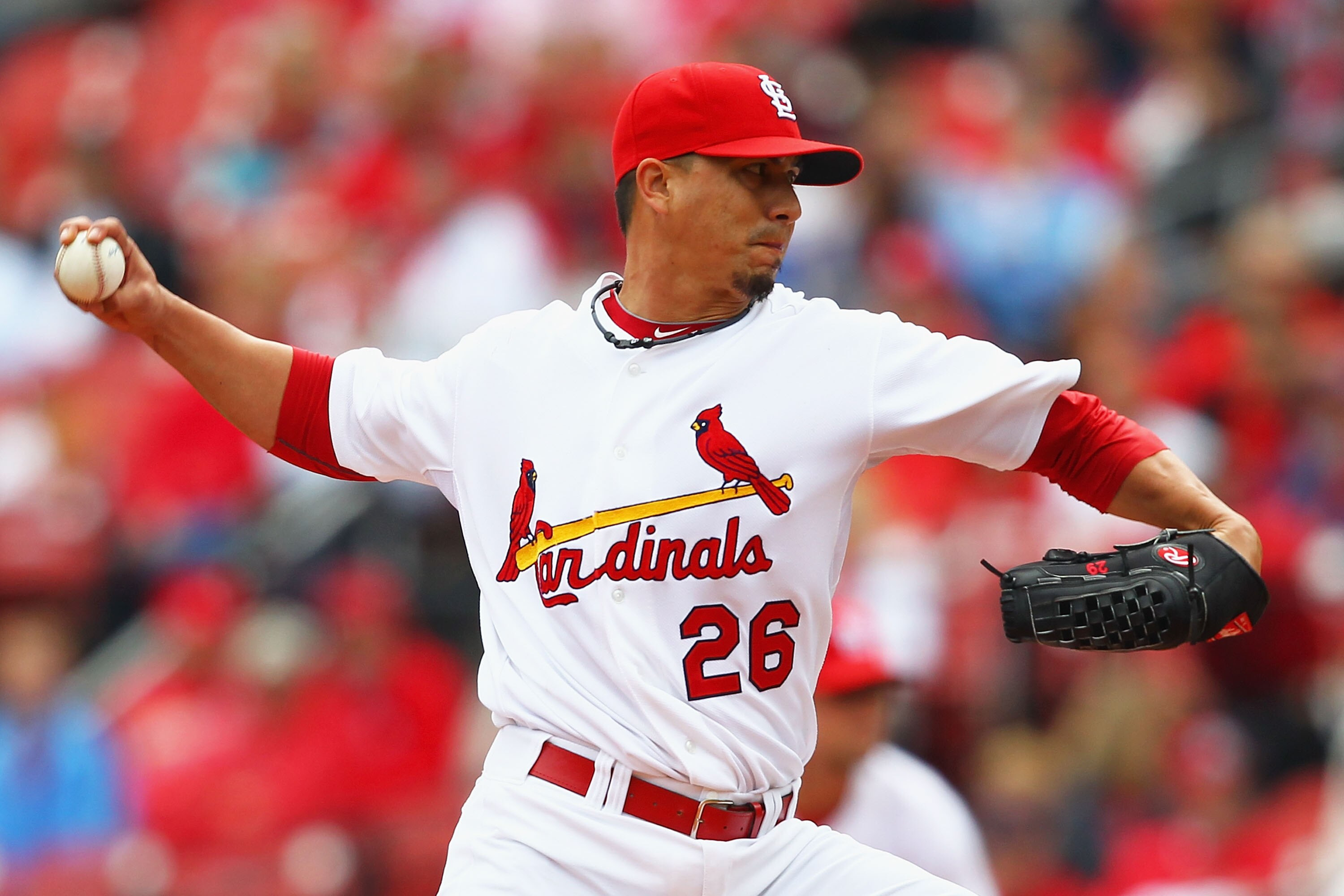 ST. LOUIS - OCTOBER 2: Starter Kyle Lohse #26 of the St. Louis Cardinals pitches against the Colorado Rockies at Busch Stadium on October 2, 2010 in St. Louis, Missouri.  The Cardinals beat the Rockies 1-0 in 11 innings.  (Photo by Dilip Vishwanat/Getty I