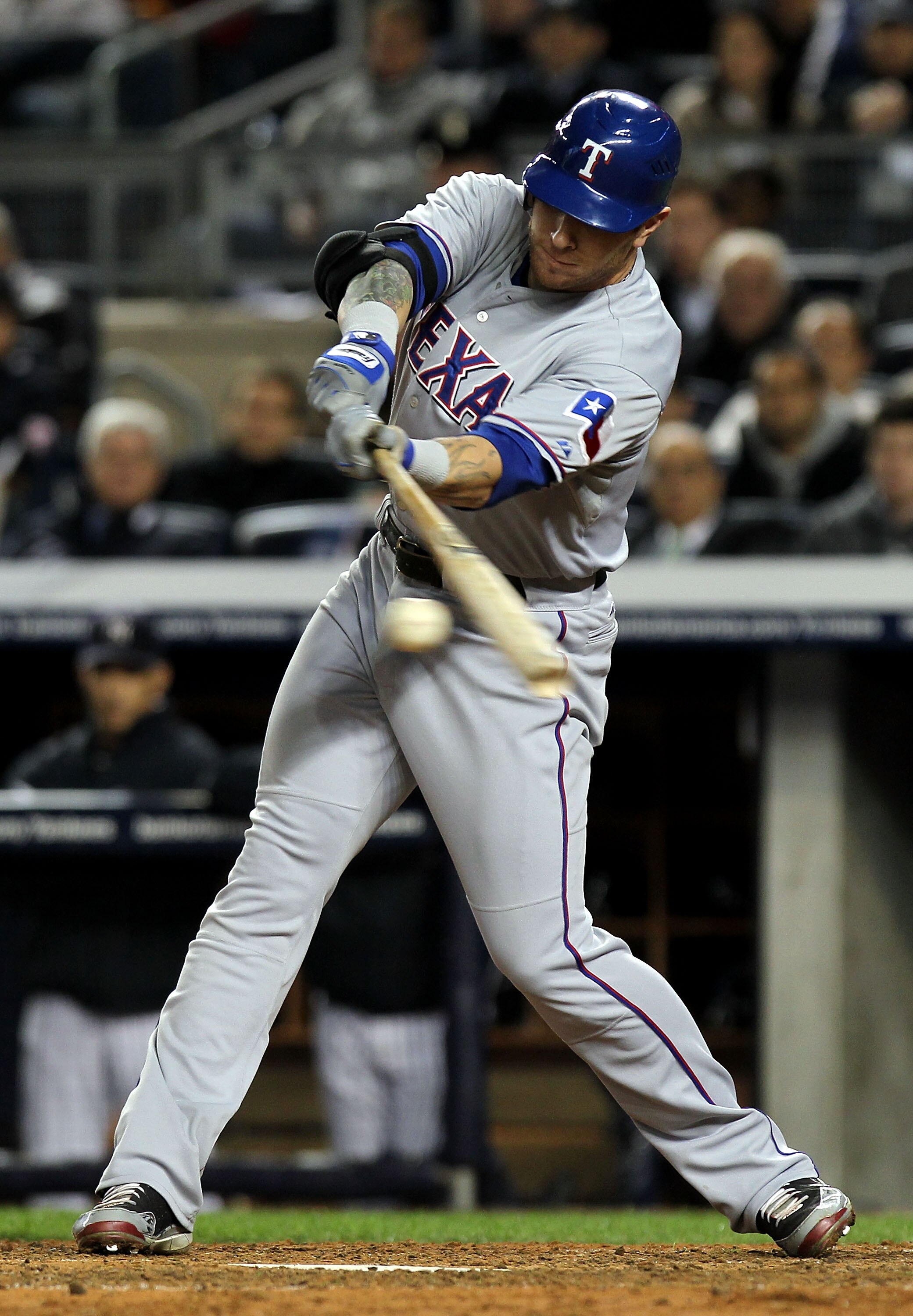 NEW YORK - OCTOBER 18:  Josh Hamilton #32 of the Texas Rangers hits a double in the top of the ninth inning against the New York Yankees in Game Three of the ALCS during the 2010 MLB Playoffs at Yankee Stadium on October 18, 2010 in New York, New York.  (