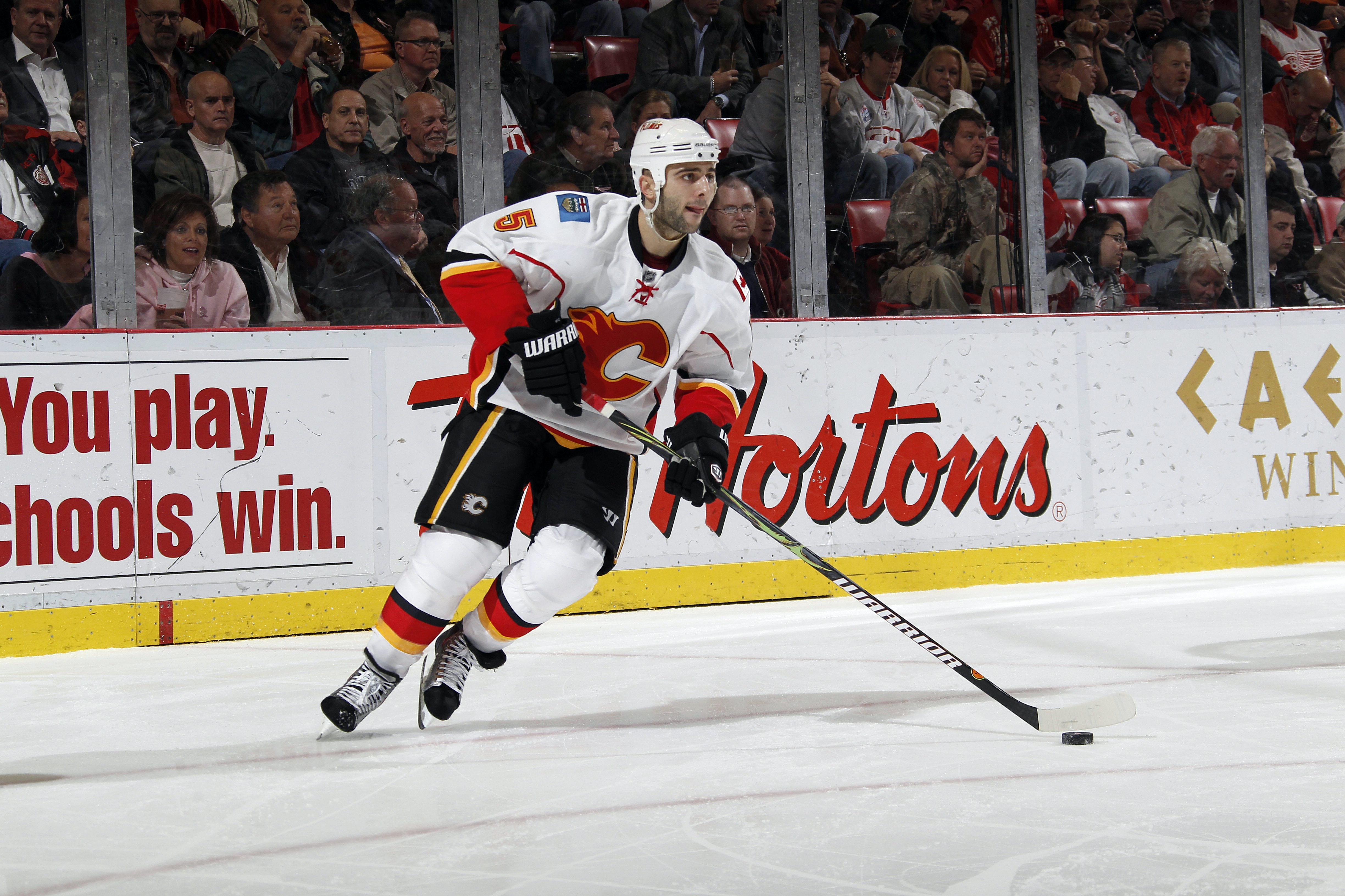 DETROIT - OCTOBER 21:  Mark Giordano #5 of the Calgary Flames skates during a game against the Detroit Red Wings on October 21, 2010 at the Joe Louis Arena in Detroit, Michigan.  (Photo by Gregory Shamus/Getty Images)
