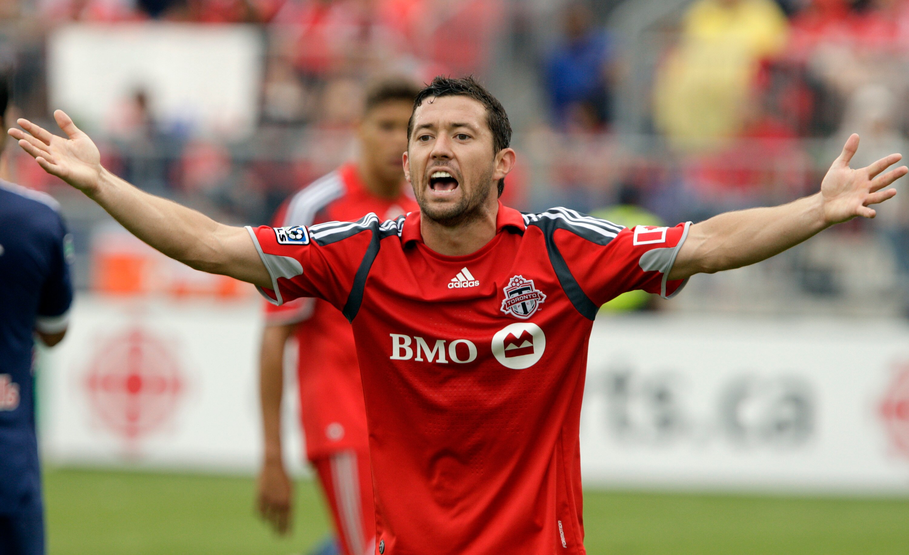 TORONTO - AUGUST 21: Dan Gargan #8 of Toronto FC argues an offside call that resulted in a New York Red Bulls goal during a MLS game at BMO Field August 21, 2010 in Toronto, Ontario, Canada. (Photo by Abelimages/Getty Images)
