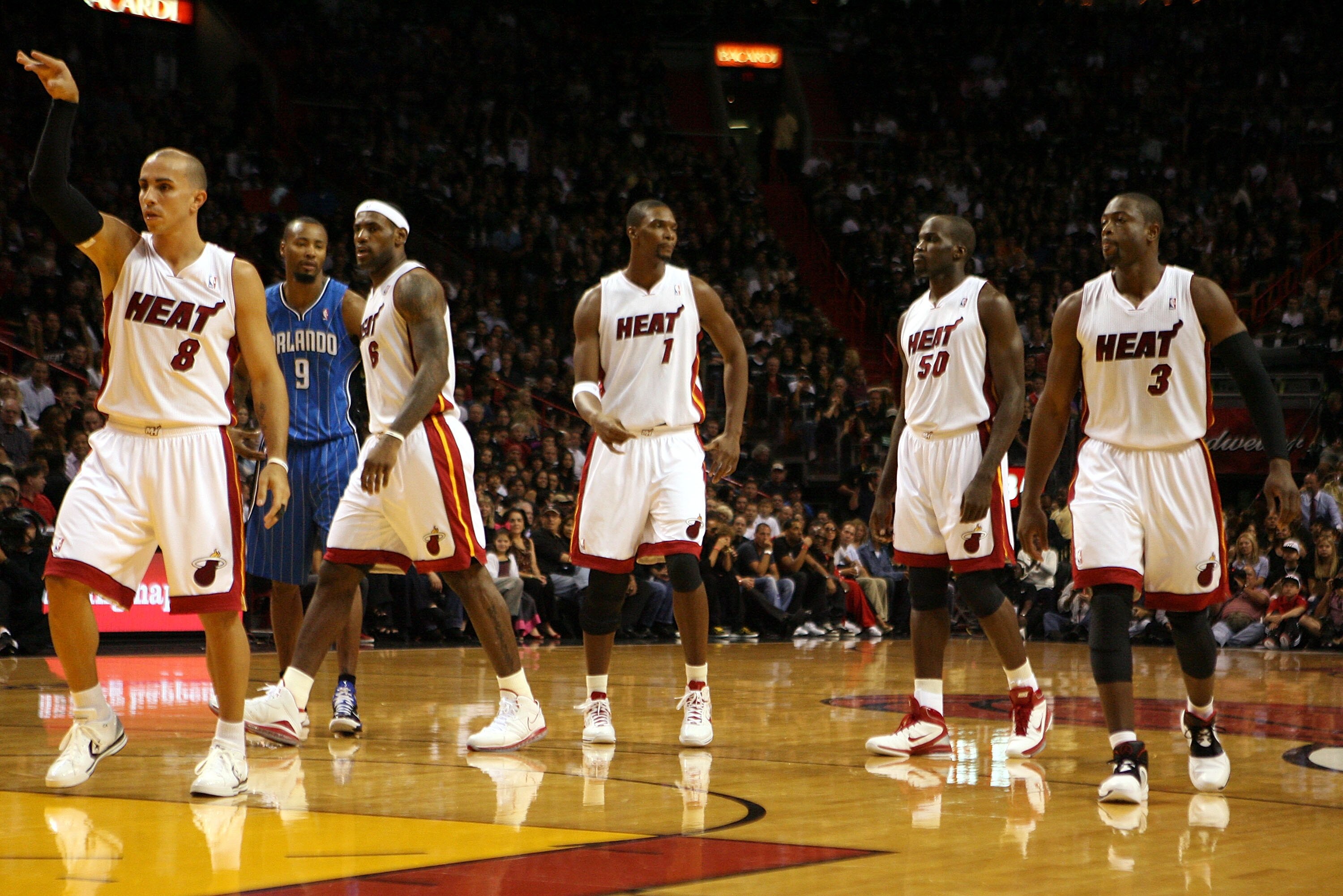 MIAMI - OCTOBER 29:  Starting five guard Carlos Arroyo #8, Forward LeBron James #6, Forard Chris Bosh #1, Center Joel Anthony #55 and Dwyane Wade #3 of the Miami Heat take on the Orlando Magic at American Airlines Arena on October 29, 2010 in Miami, Flori