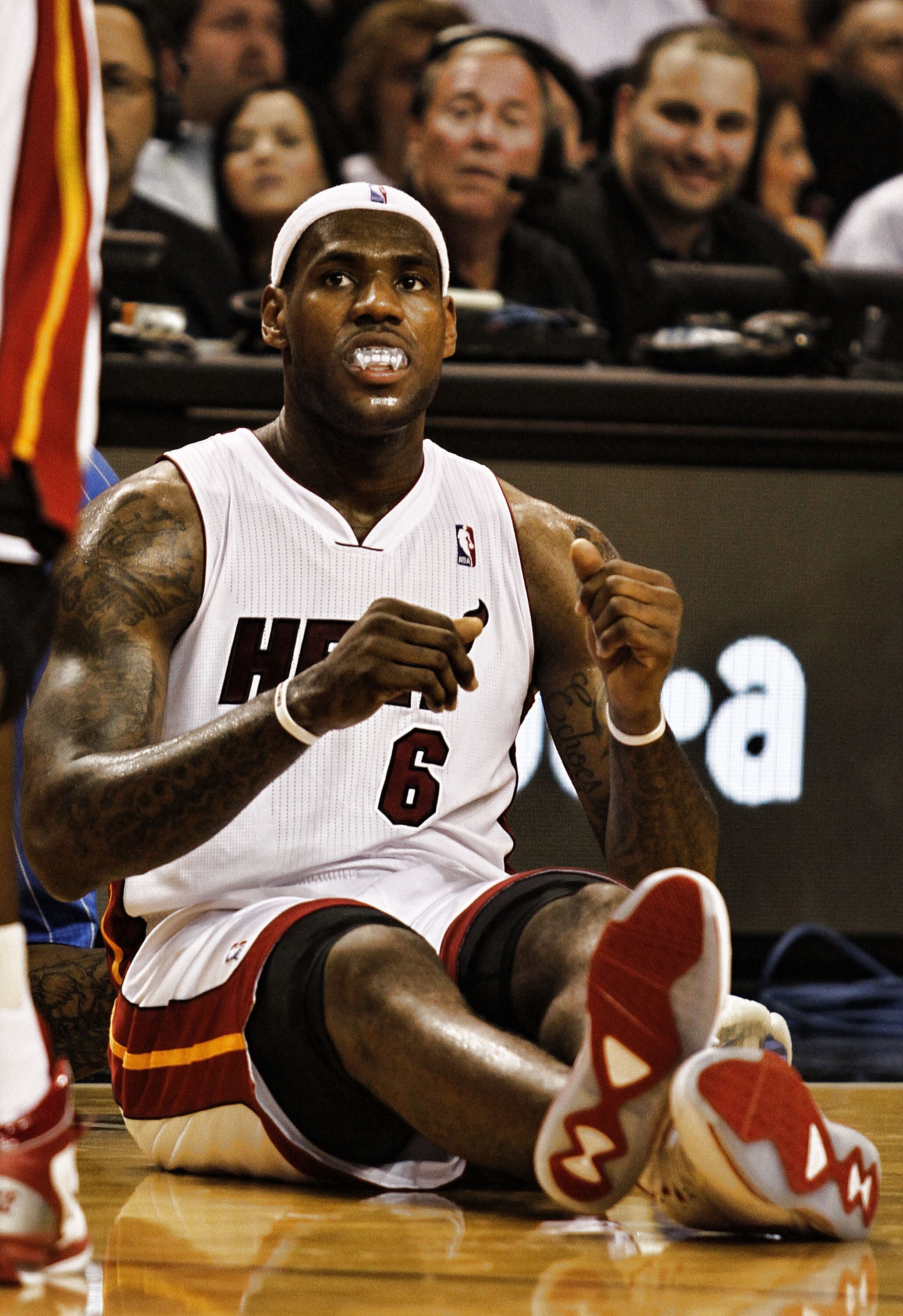 MIAMI - OCTOBER 29:  Forward LeBron James #6 of  the Miami Heat wears a vampire teeth mouth guard as his team takes on the Orlando Magic at American Airlines Arena on October 29, 2010 in Miami, Florida.  NOTE TO USER: User expressly acknowledges and agree