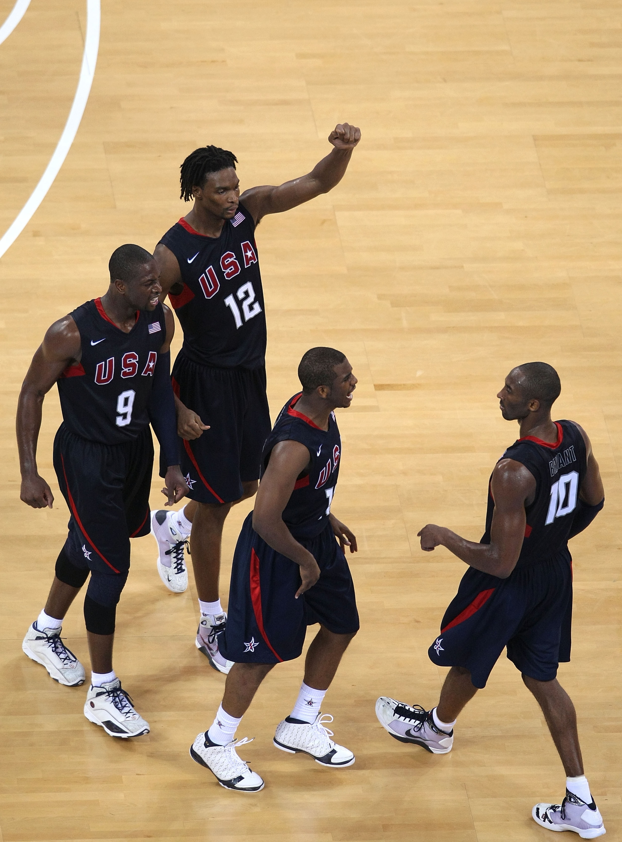 BEIJING - AUGUST 24:  Dwyane Wade #9, Chris Bosh #12 and Chris Paul #13 celebrate with Kobe Bryant #19 of the United States after Bryant made a three point shot in the gold medal game against Spain during Day 16 of the Beijing 2008 Olympic Games at the Be