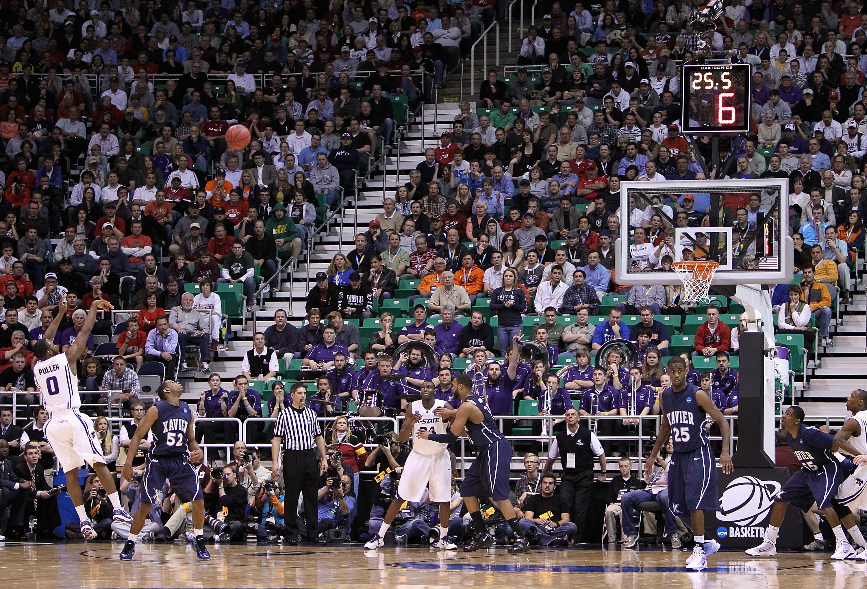 SALT LAKE CITY - MARCH 25:  Jacob Pullen #0 of the Kansas State Wildcats puts up a three point shot late in regulation against the Xavier Musketeers during the west regional semifinal of the 2010 NCAA men's basketball tournament at the Energy Solutions Ar
