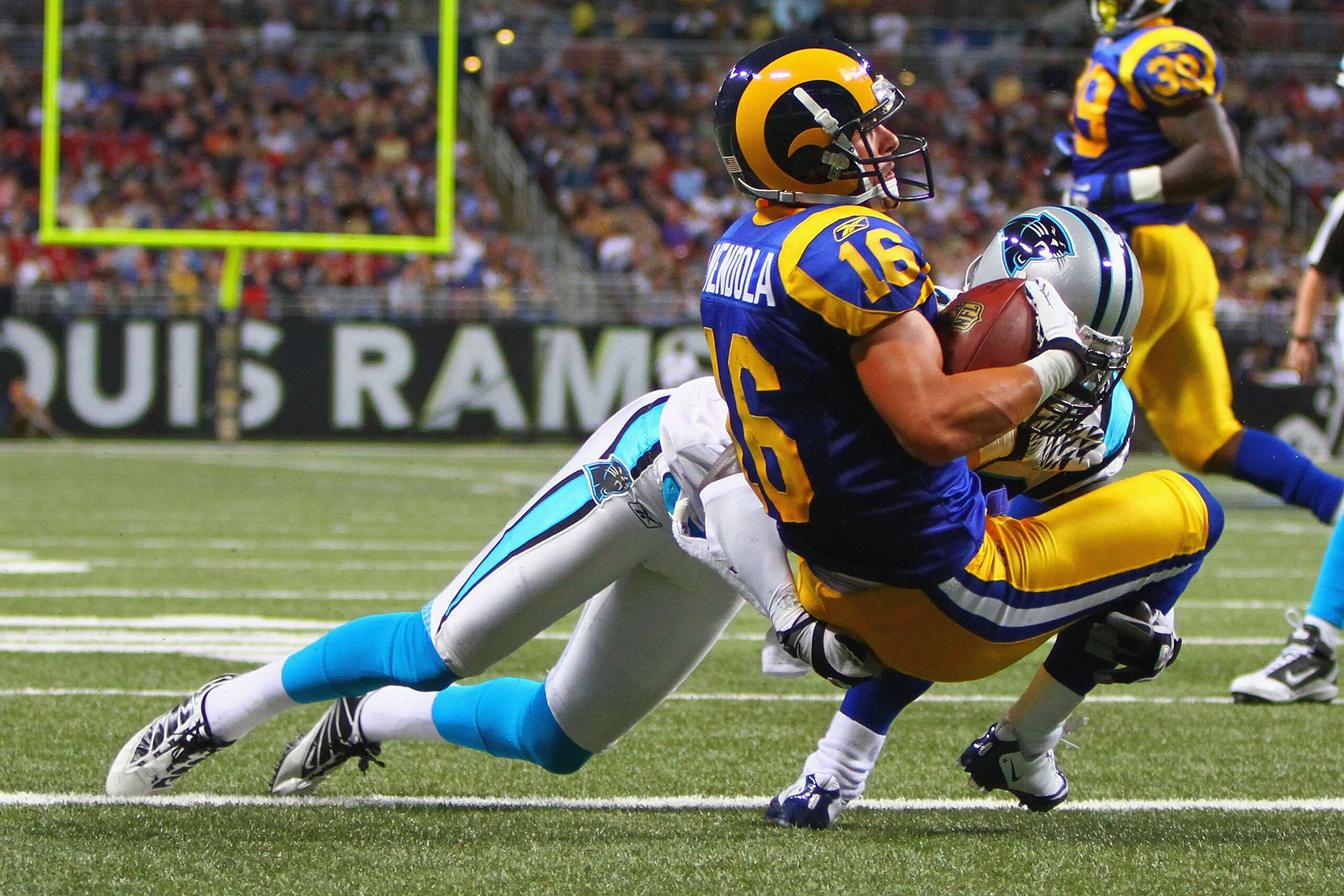 ST. LOUIS - OCTOBER 31: Danny Amendola #16 of the St. Louis Rams scores a touchdown against the Carolina Panthers at the Edward Jones Dome on October 31, 2010 in St. Louis, Missouri. The Rams beat the Panthers 20-10. (Photo by Dilip Vishwanat/Getty Imag ST. LOUIS - OCTOBER 31: Danny Amendola #16 of the St. Louis Rams scores a touchdown against the Carolina Panthers at the Edward Jones Dome on October 31, 2010 in St. Louis, Missouri. The Rams beat the Panthers 20-10. (Photo by Dilip Vishwanat/Getty Imag
