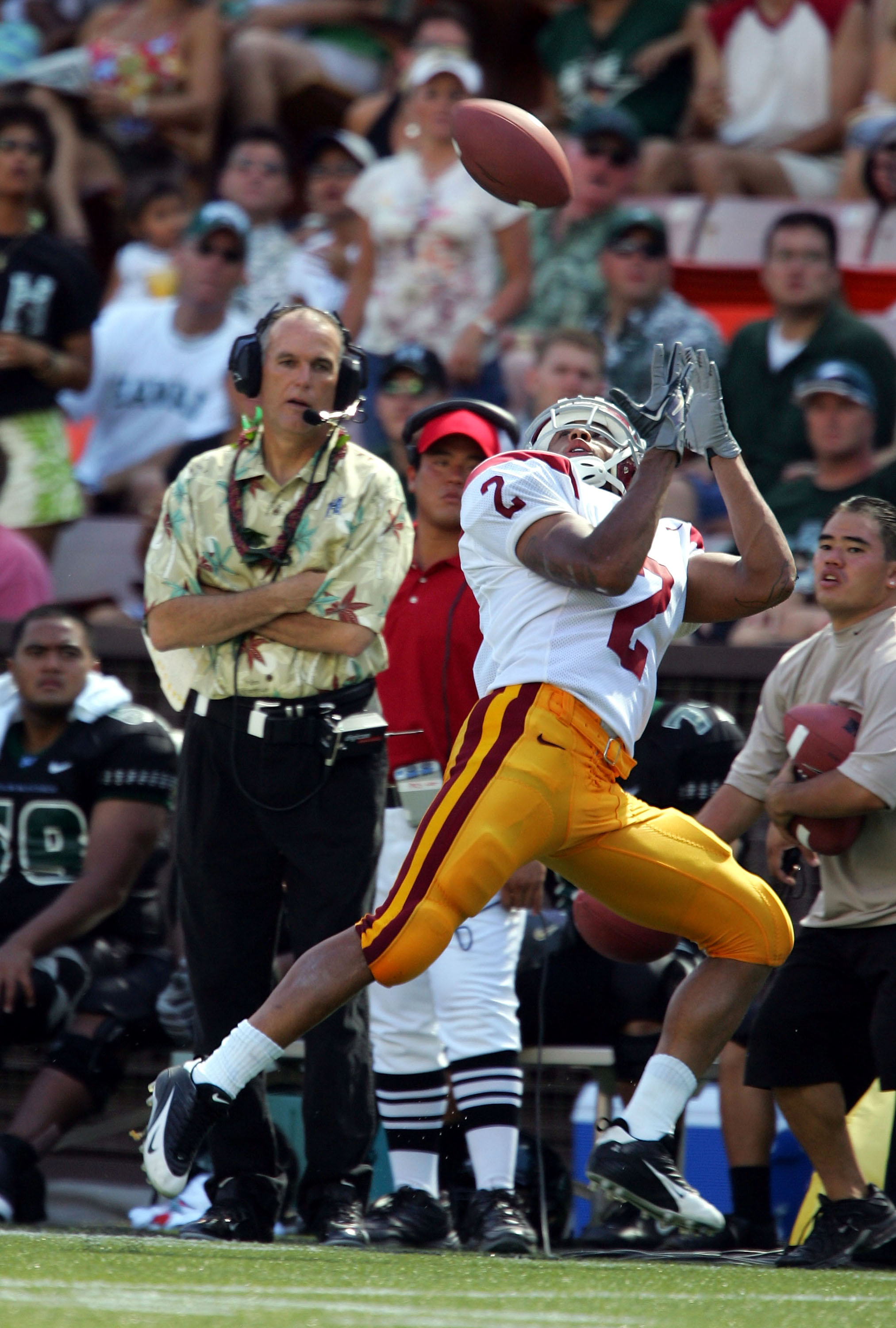 HONOLULU, HI -  SEPTEMBER 3:  Steve Smith #2 of USC makes an over the head catch on the sidelines during a  63-17 win over Hawaii at Aloha Stadium on September 3, 2005 in Honolulu, Hawaii.  (Photo by Harry How/Getty Images)