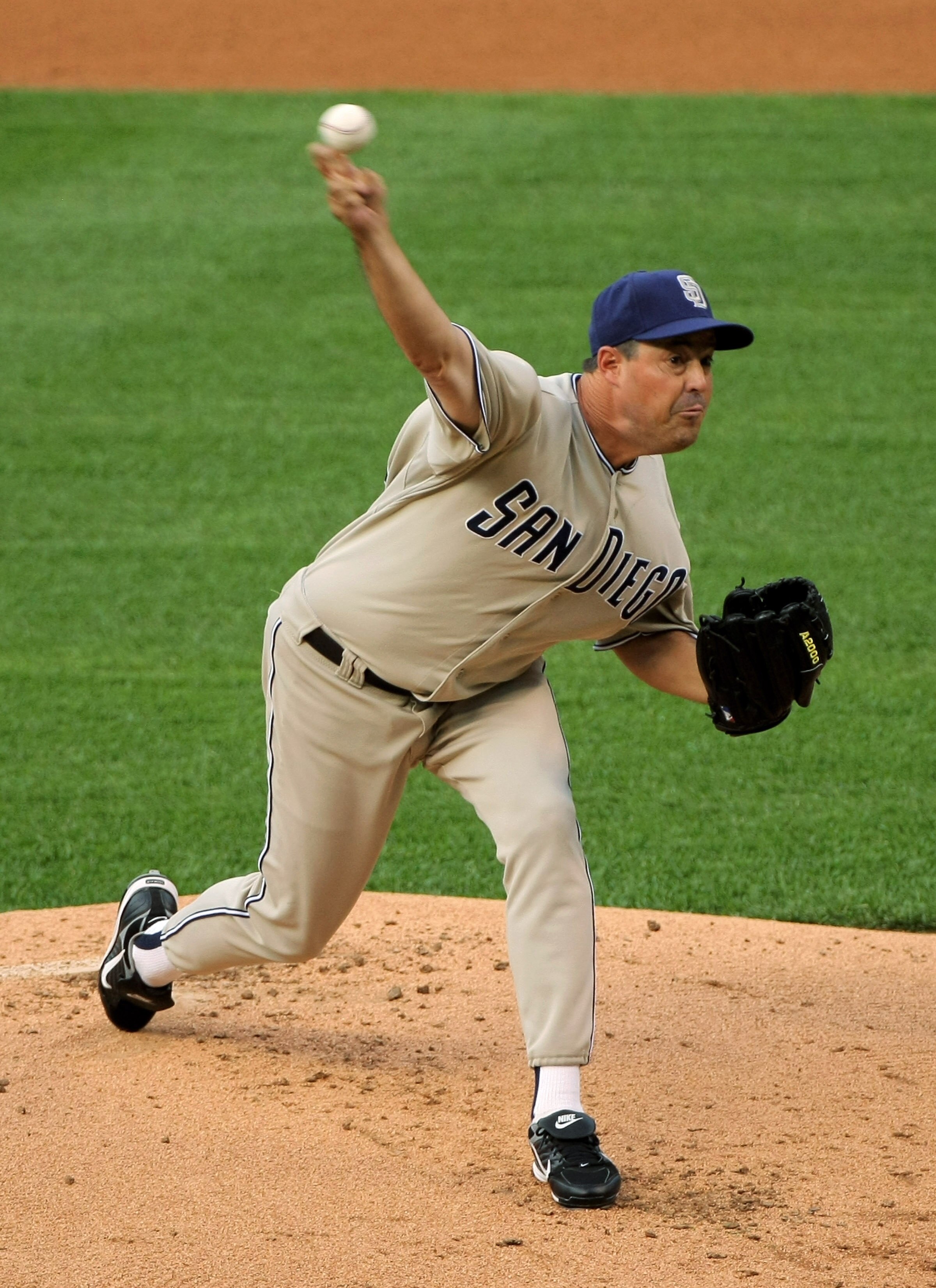 DENVER - JUNE 30:  Starting pitcher Greg Maddux #30 of the San Diego Padres delivers against the Colorado Rockies at Coors Field on June 30, 2008 in Denver, Colorado.  (Photo by Doug Pensinger/Getty Images)